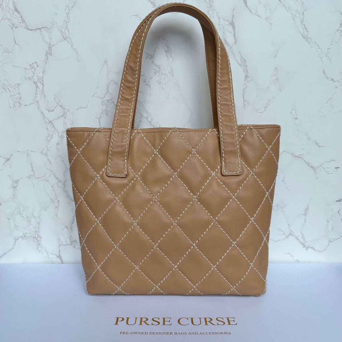 Back authentic Chanel handbag beige