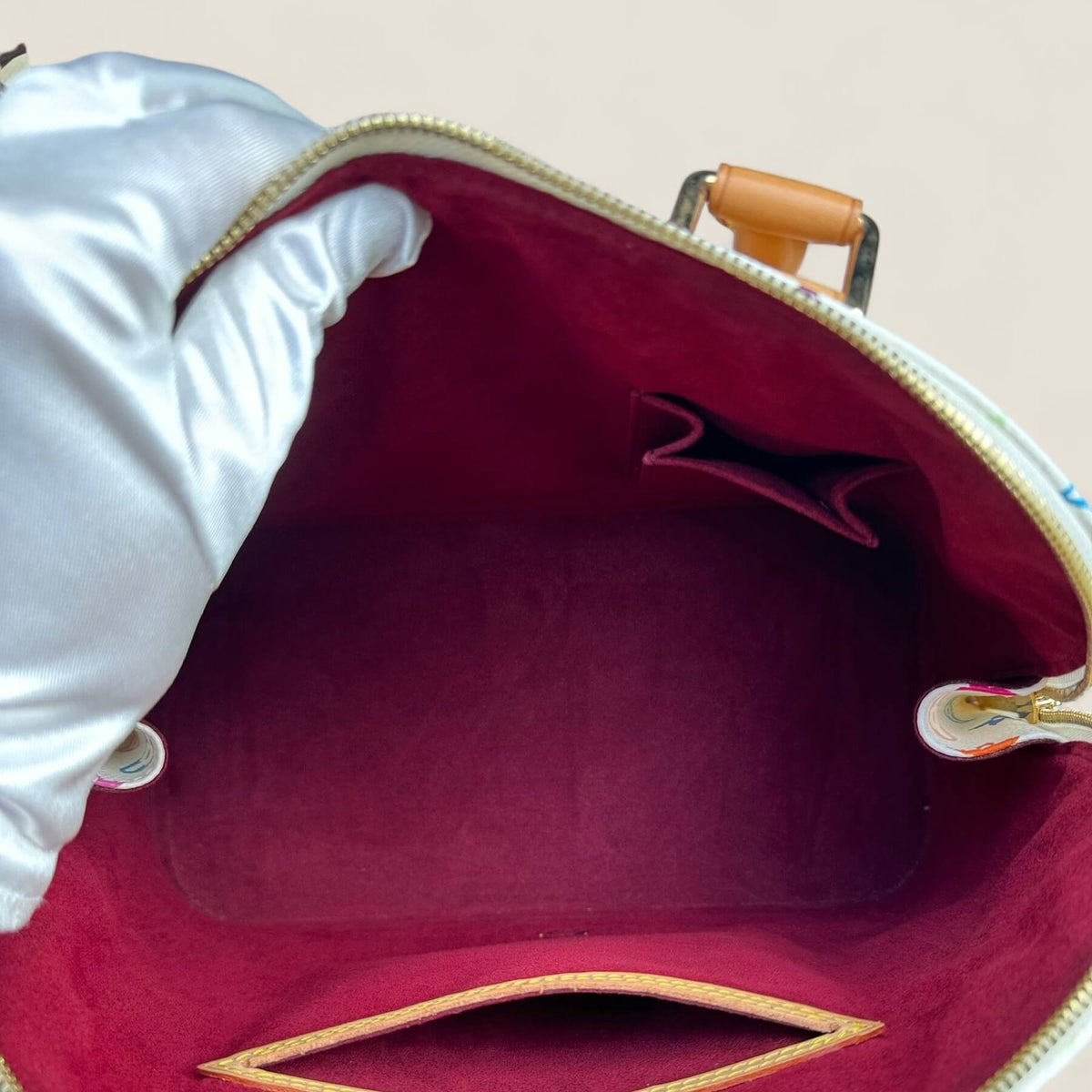 Inside a pre-owned Louis Vuitton Alma PM