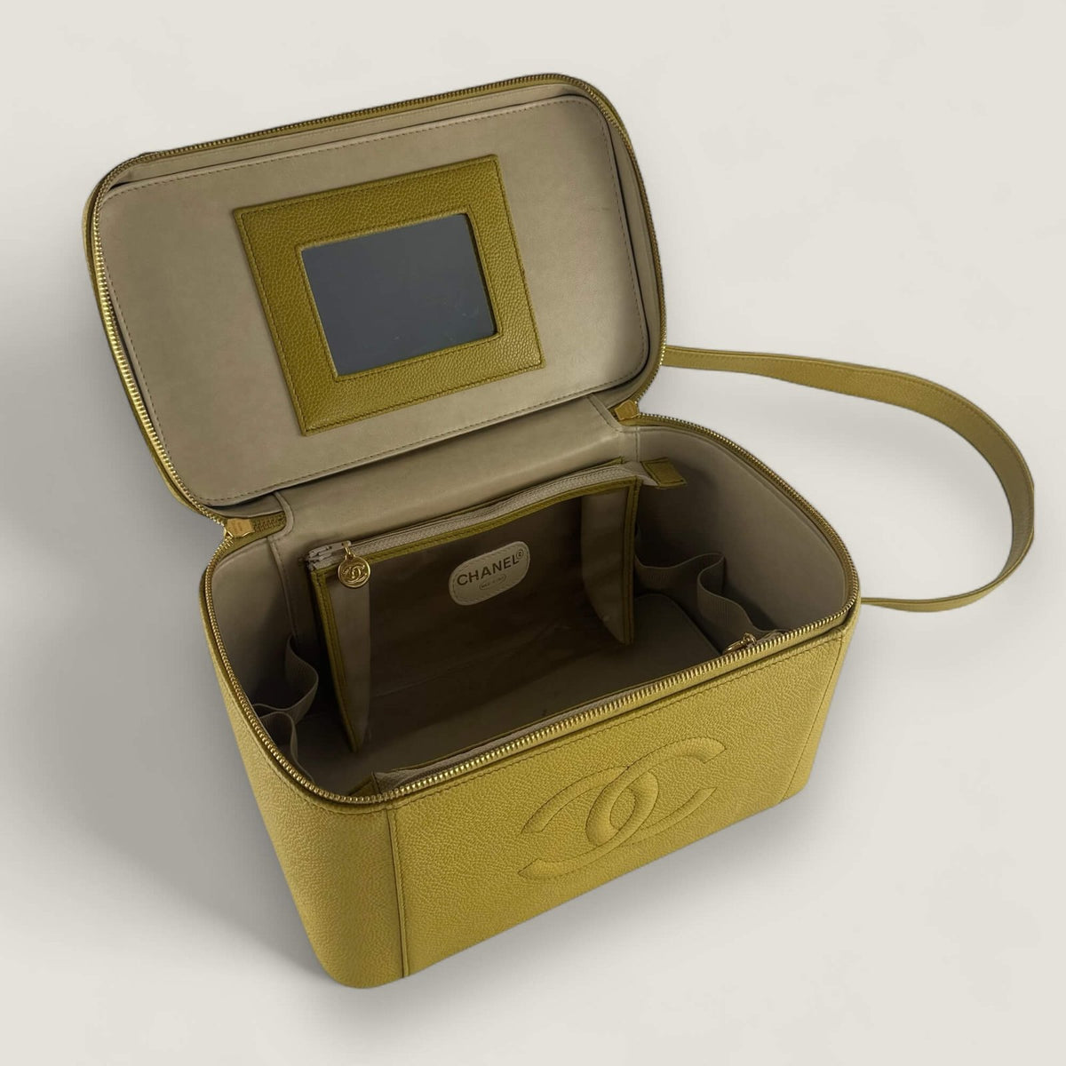 Inside vintage Chanel vanity shoulder bag