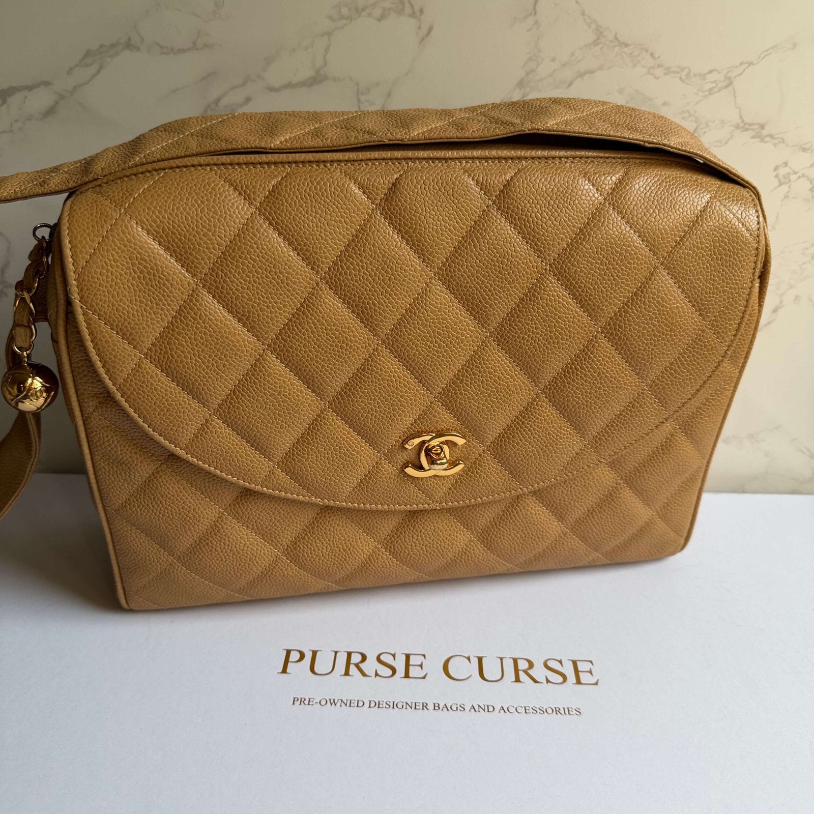 Chanel CC quilted camera bag caviar leather