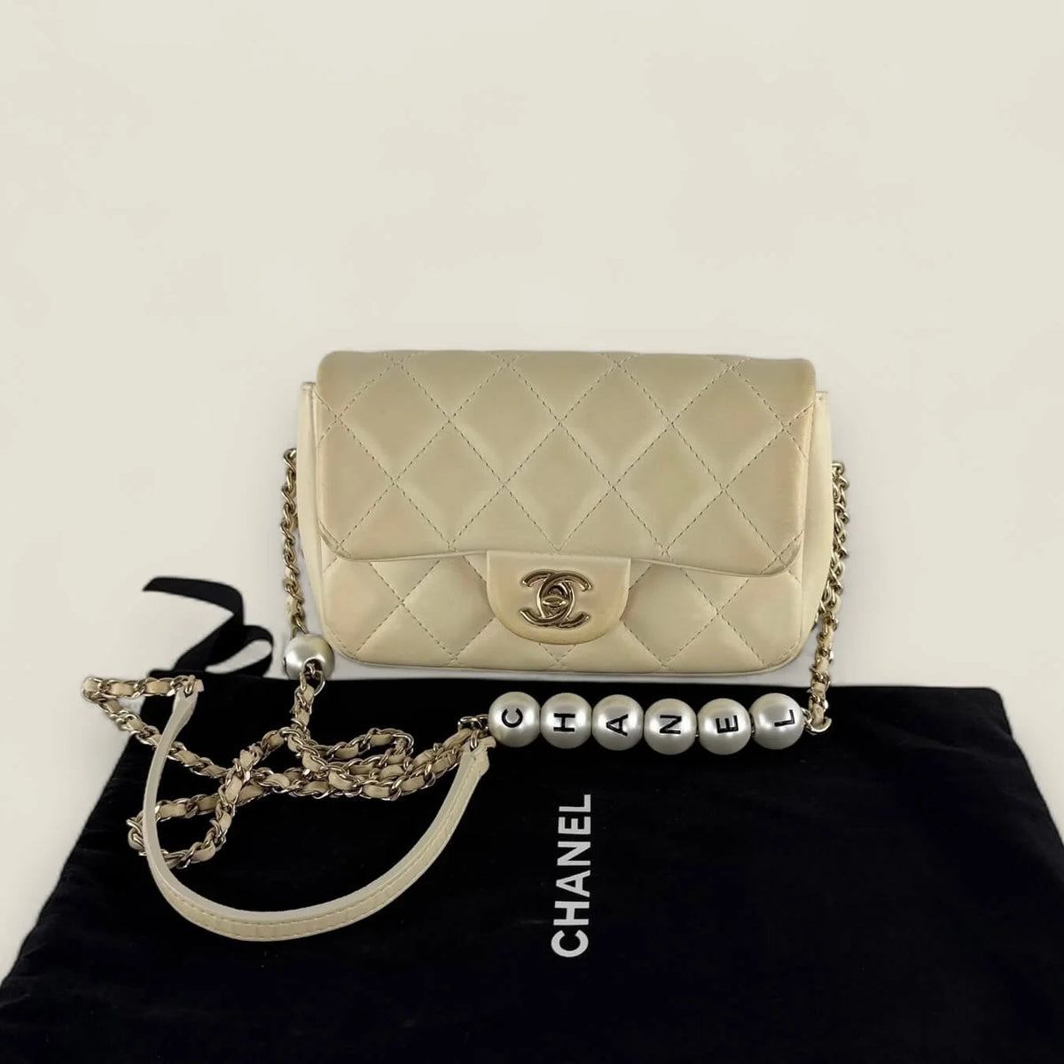 Chanel Mini Flap with pearl chain pre-owned front