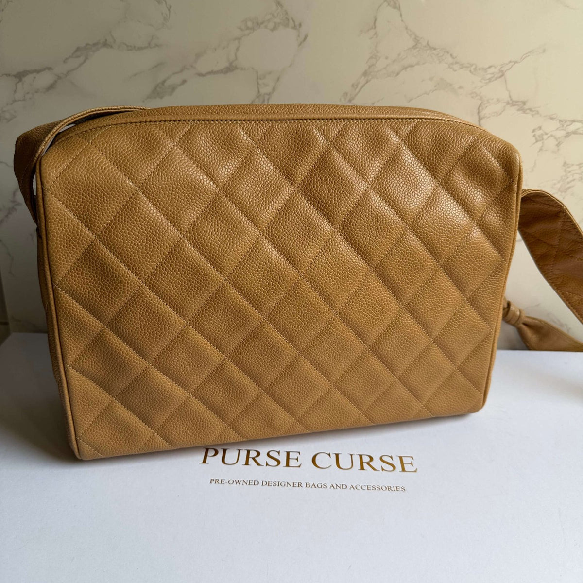 Chanel classic caviar camera bag beige