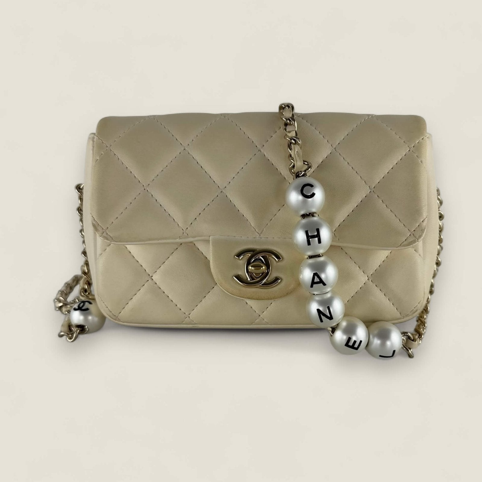 Chanel mini flap with pearl chain