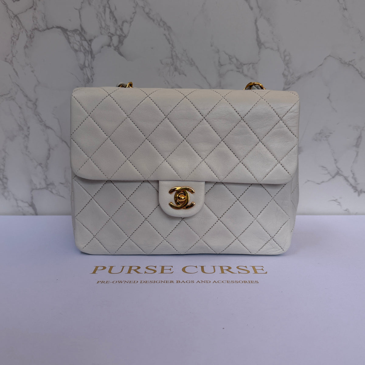 Chanel mini classic flap wit lamsleer voorkant