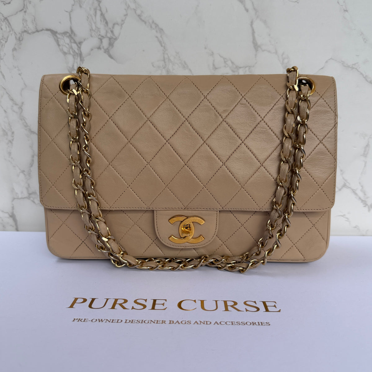 Chanel vintage medium flap beige lamsleer