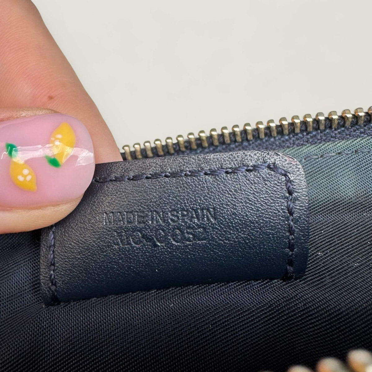 Dior authentic saddle pouch serial number 2002