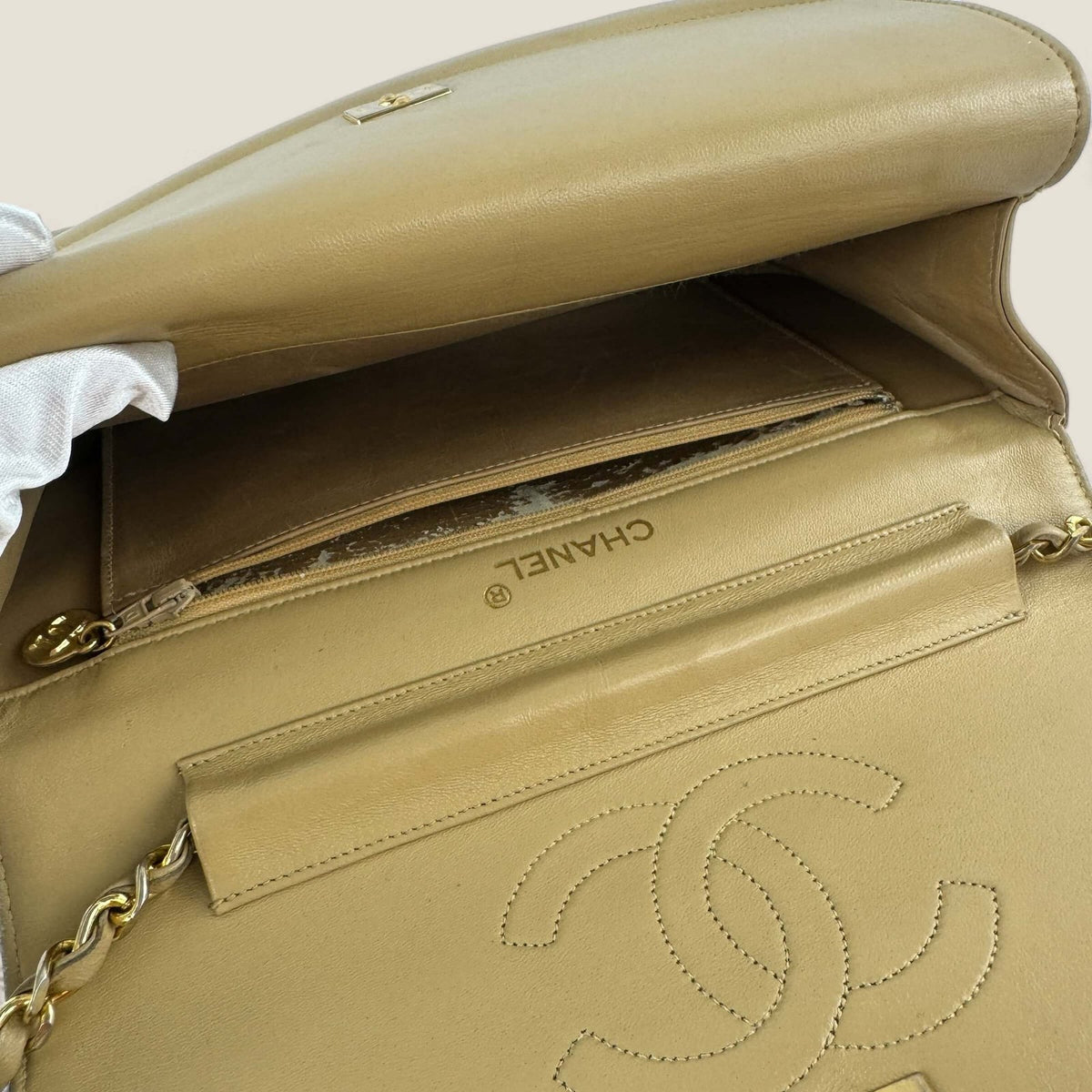 Worn Chanel bag from the 80s beige lambskin with gold hardware
