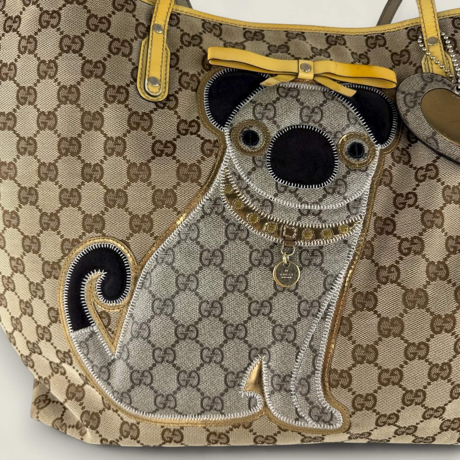 Gucci gg supreme canvas tote bag with dog