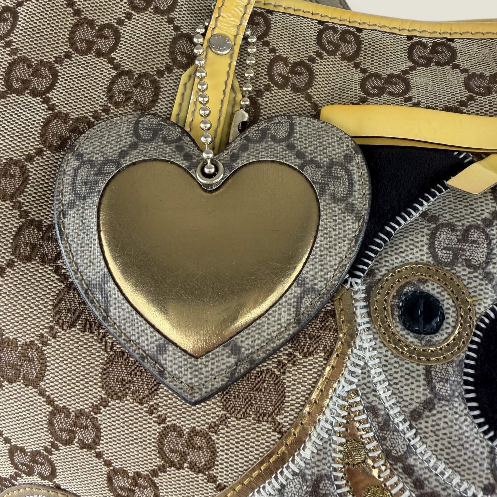 Gucci tote bag with heart charm