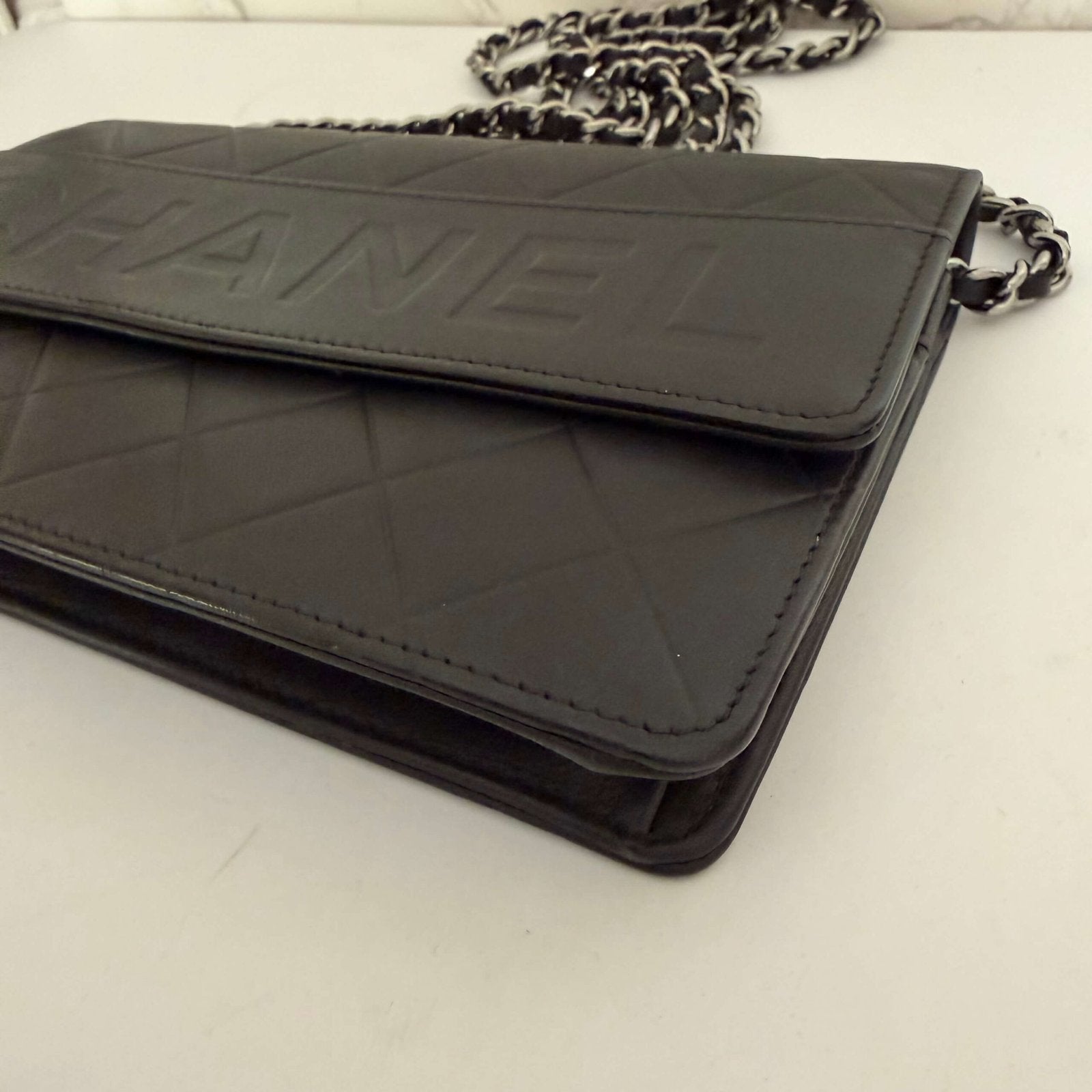 corners Chanel wallet on chain black leather