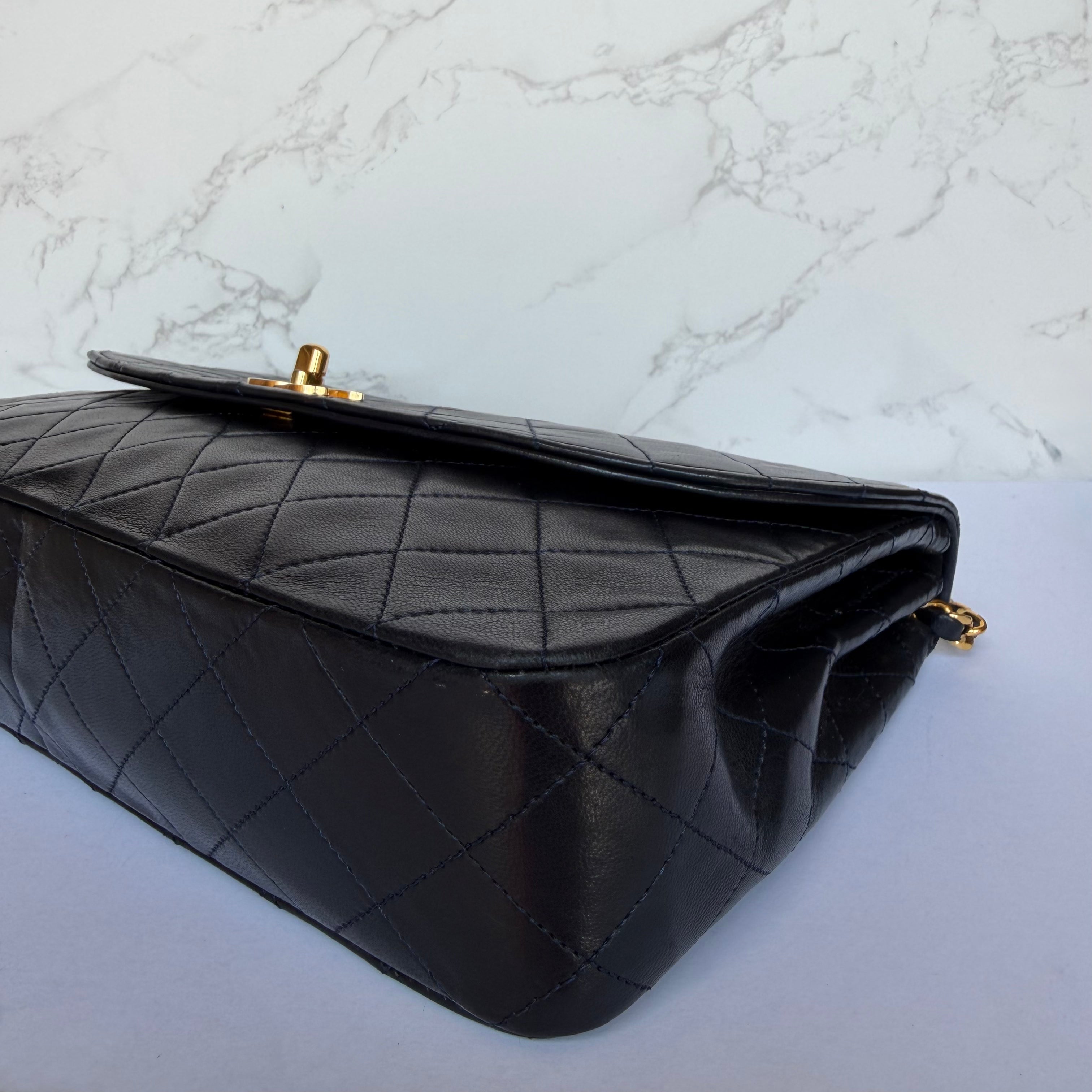 Corners of vintage Chanel lambskin single flap