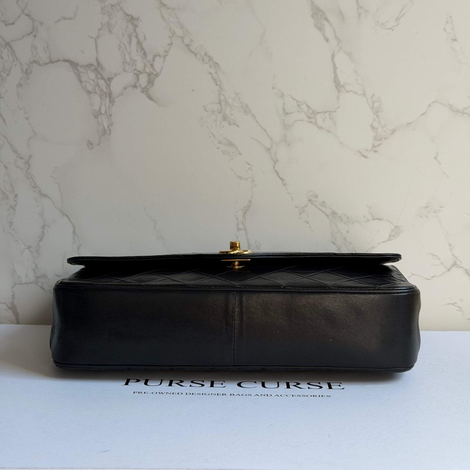 Bottom Chanel shoulder bag lamb leather black