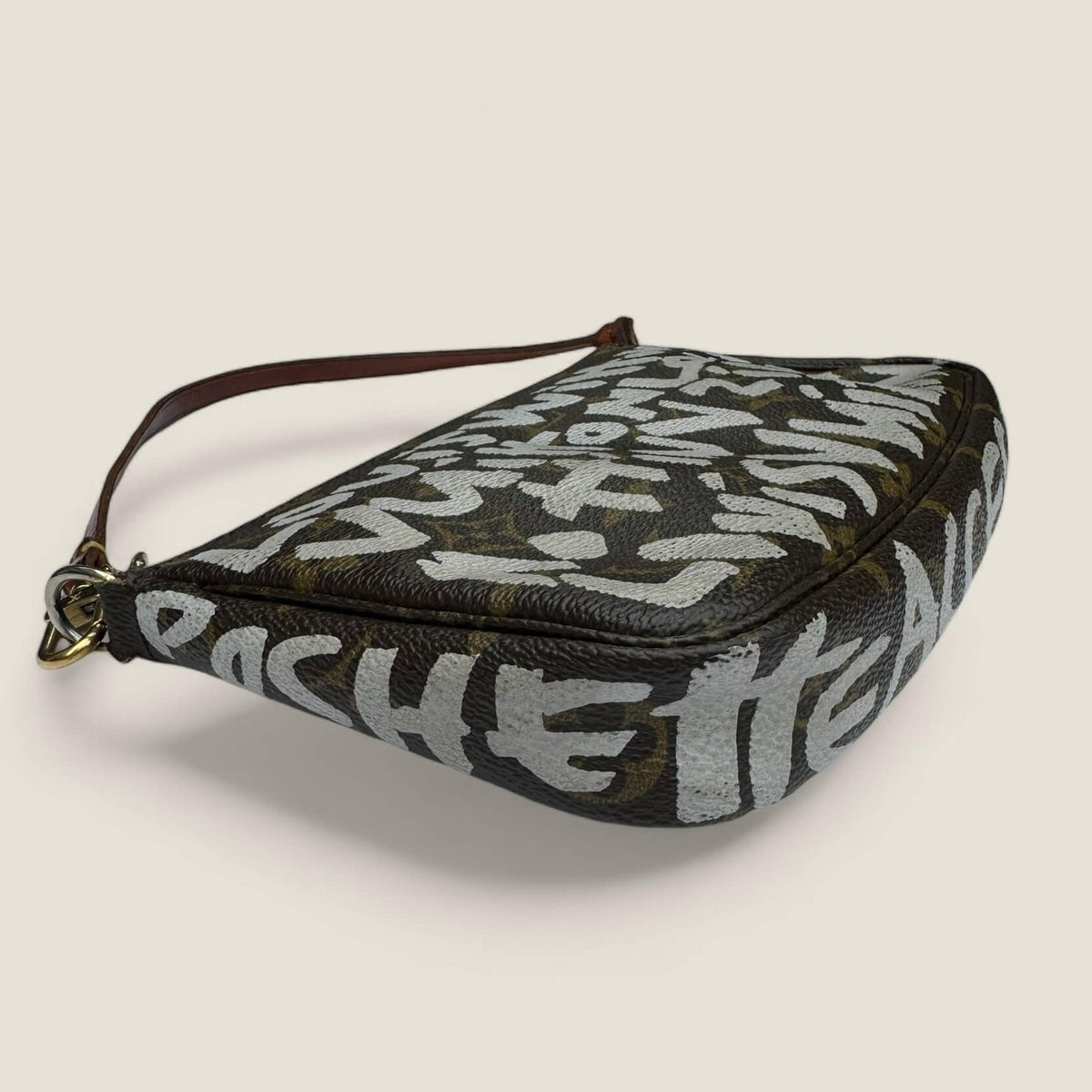 Rare pre-owned limited edition Louis Vuitton x Stephen Sprouse Graffiti Pochette Accessories from 2001