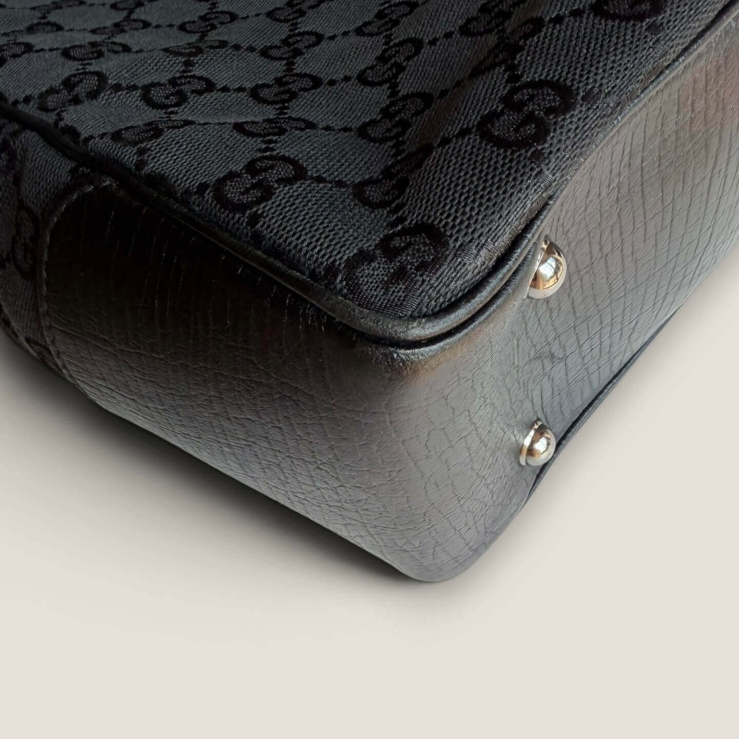 Vintage Gucci handbag signs of wear