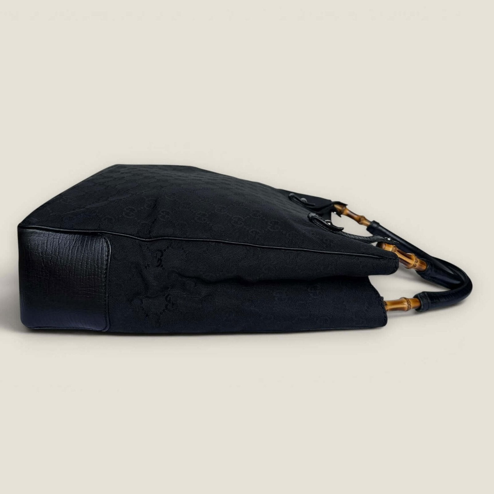 Side of vintage Gucci tote black
