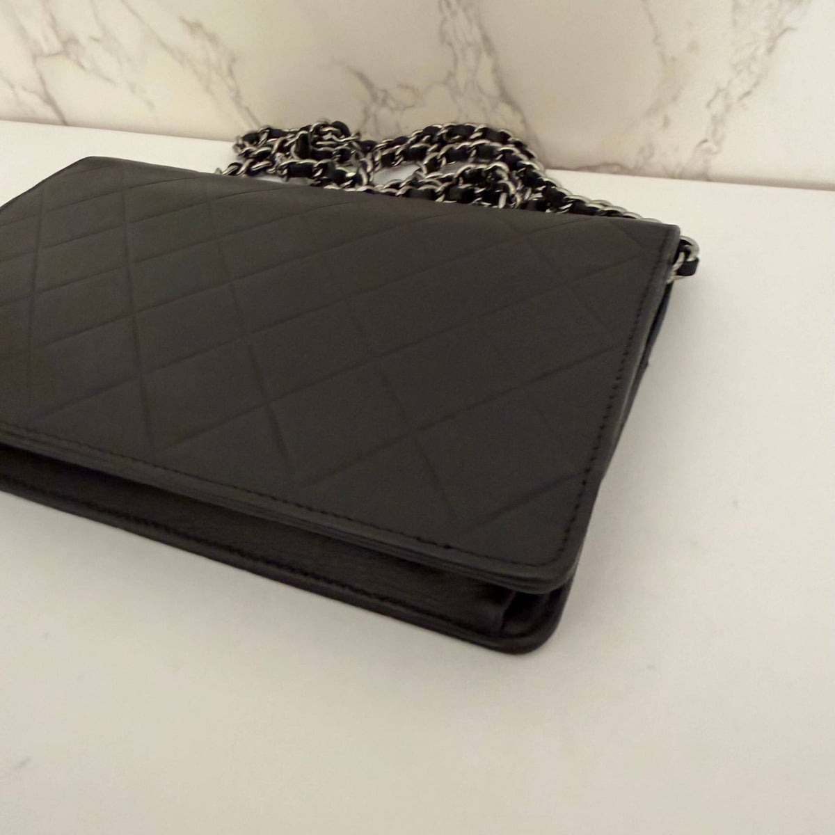 authentic Chanel WOC lambskin close up leather texture