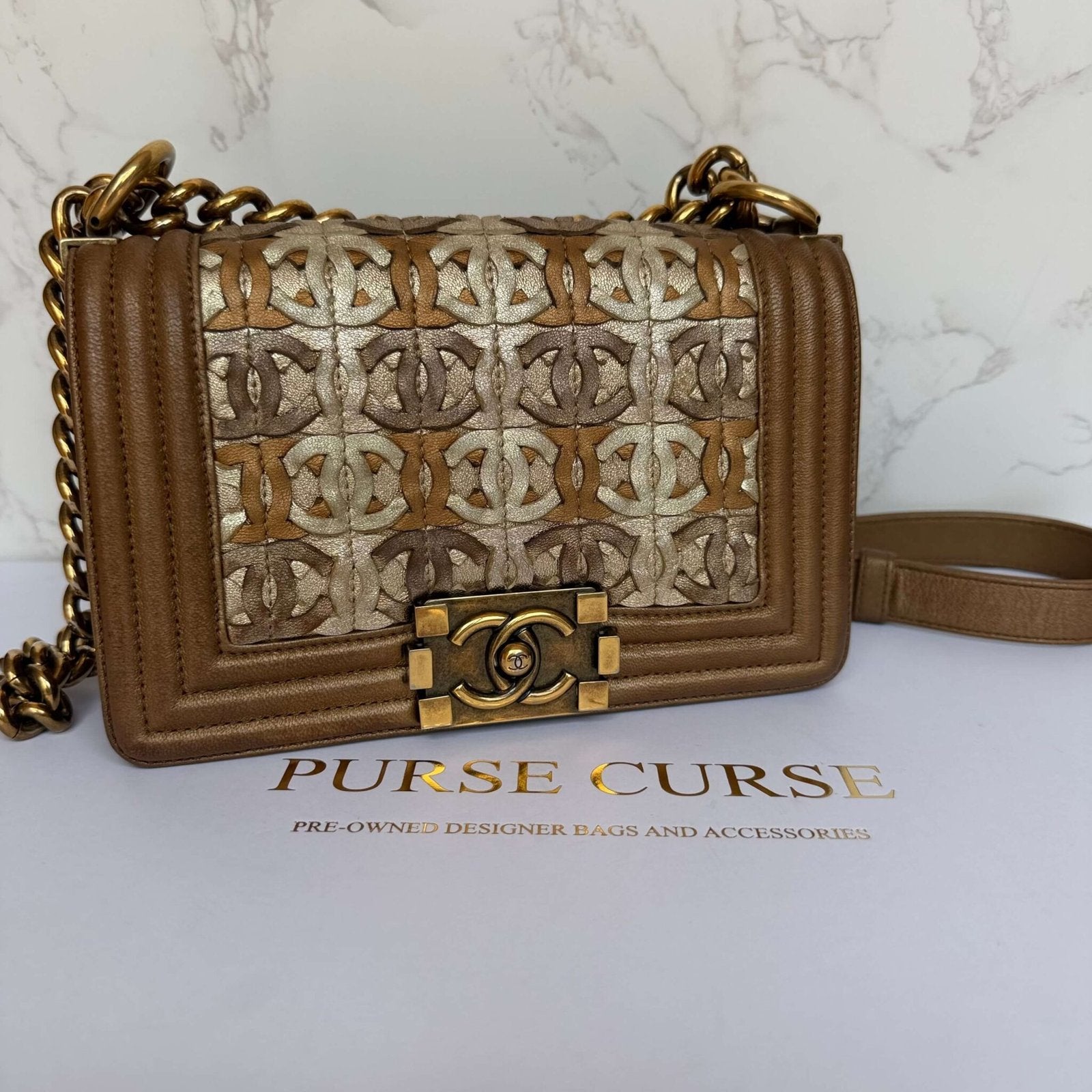 Pre-loved Chanel small quilted metallic lambskin interwoven CC Boy flap bag