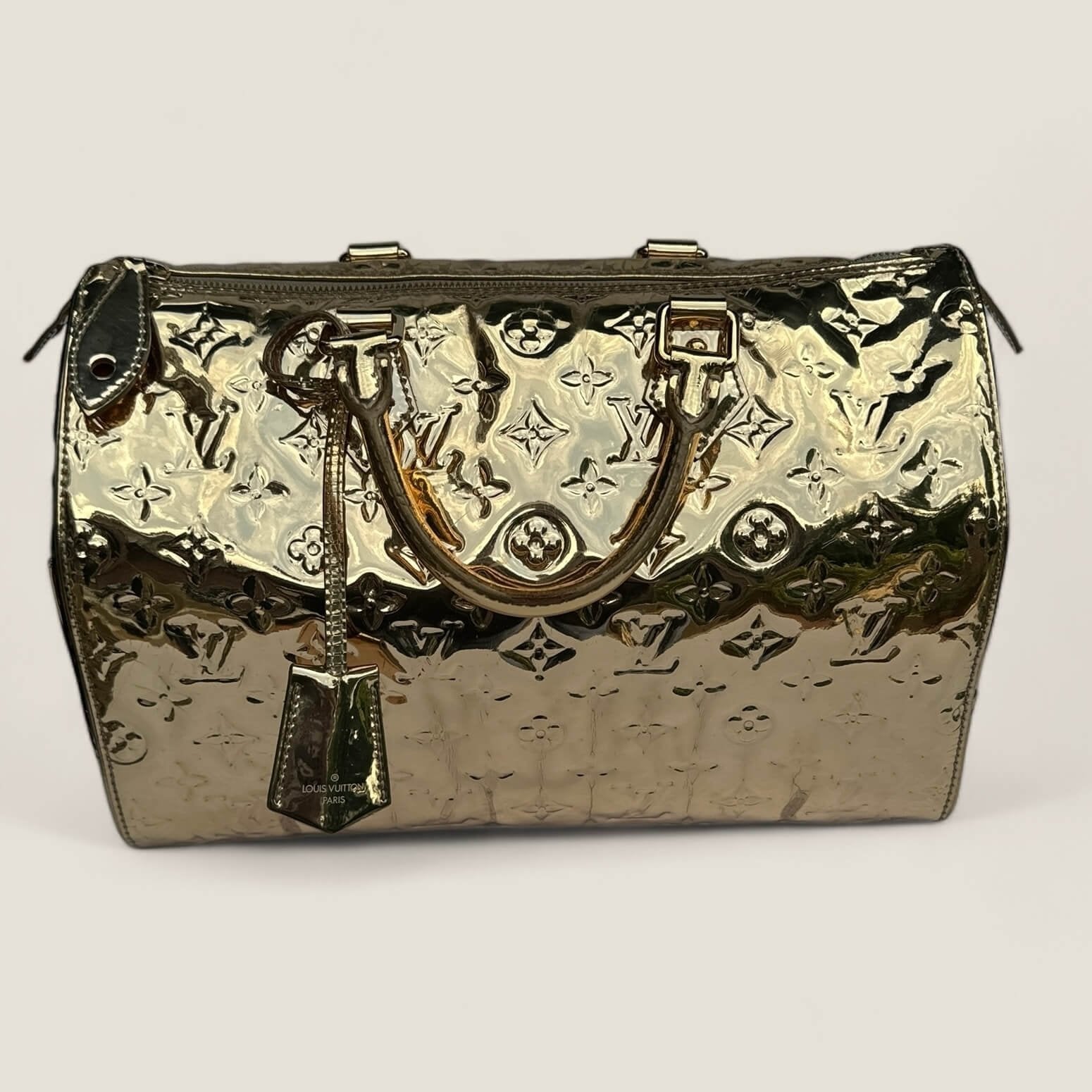 pre-loved Louis Vuitton bag gold