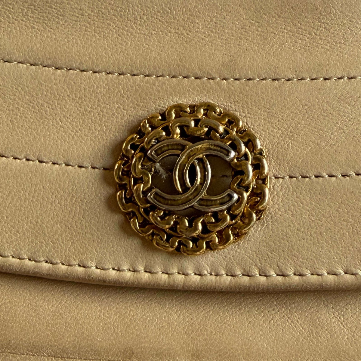 Vintage Chanel with unique push-lock detail in 24k gold plating