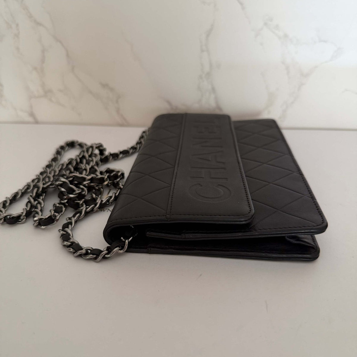 Chanel Black Quilted Lambskin Embossed LAX Wallet On Chain chain strap detail