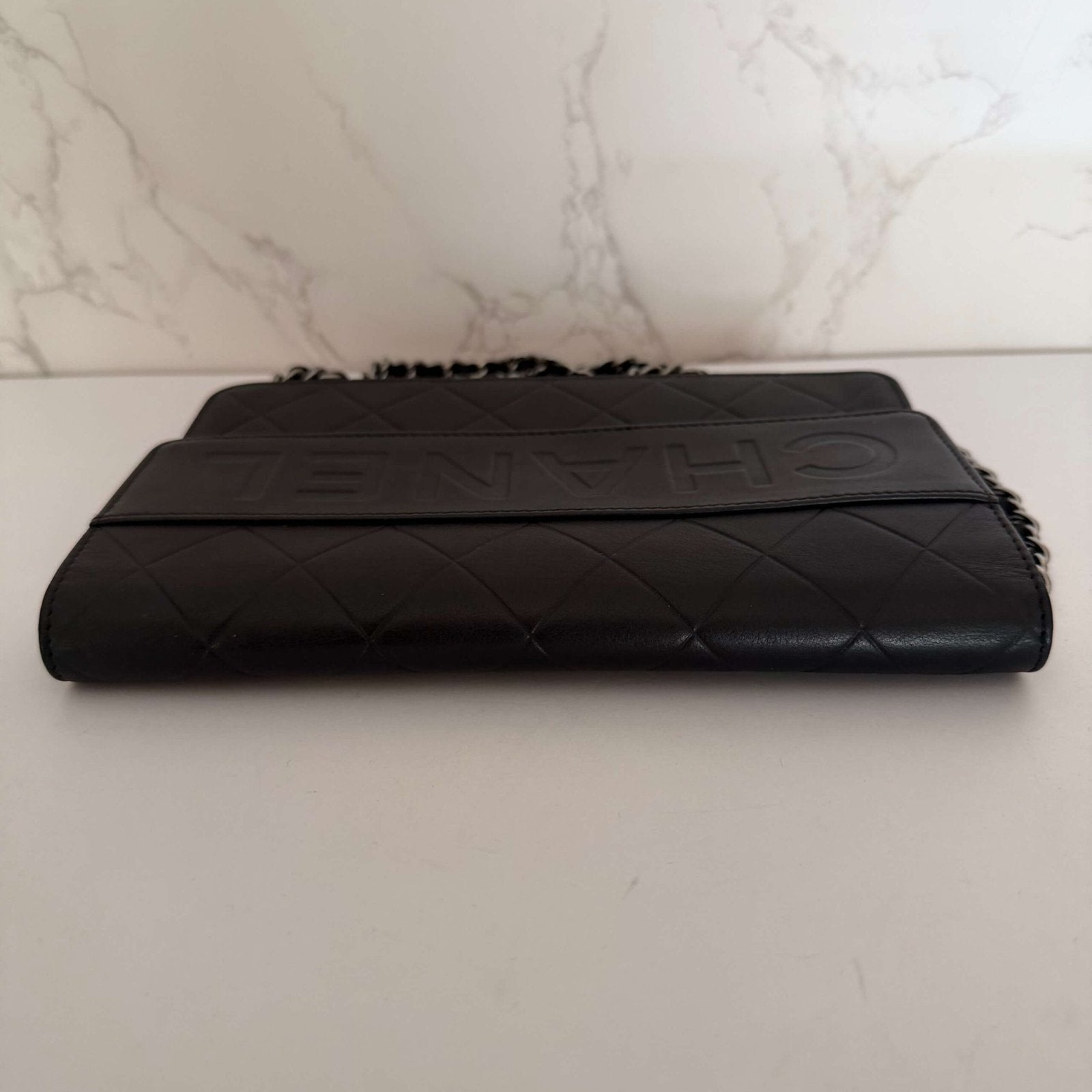 Black Chanel wallet on chain elegant corner view