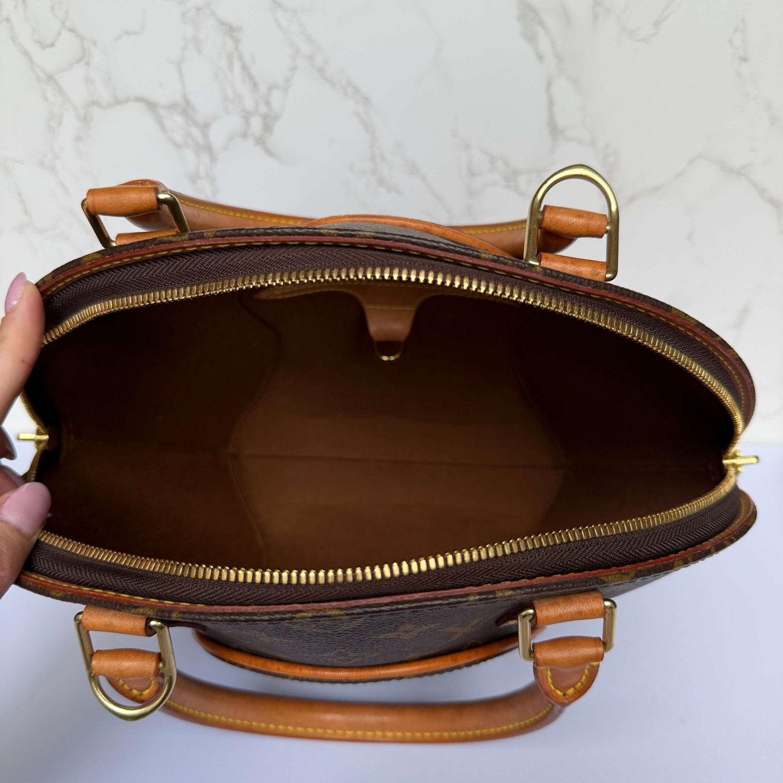 Interior of original vintage Louis Vuitton bag