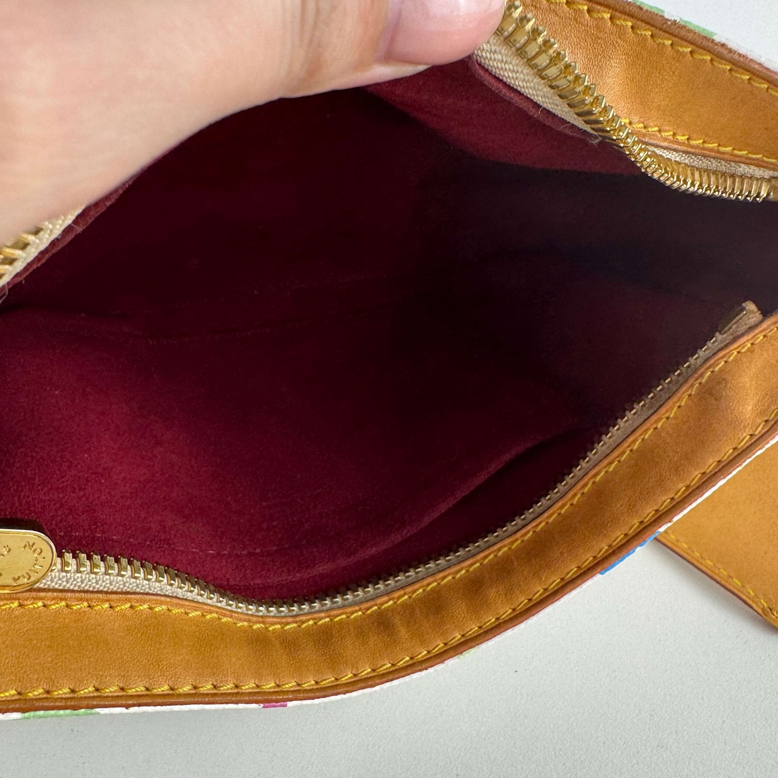 Inside vintage Louis Vuitton bag