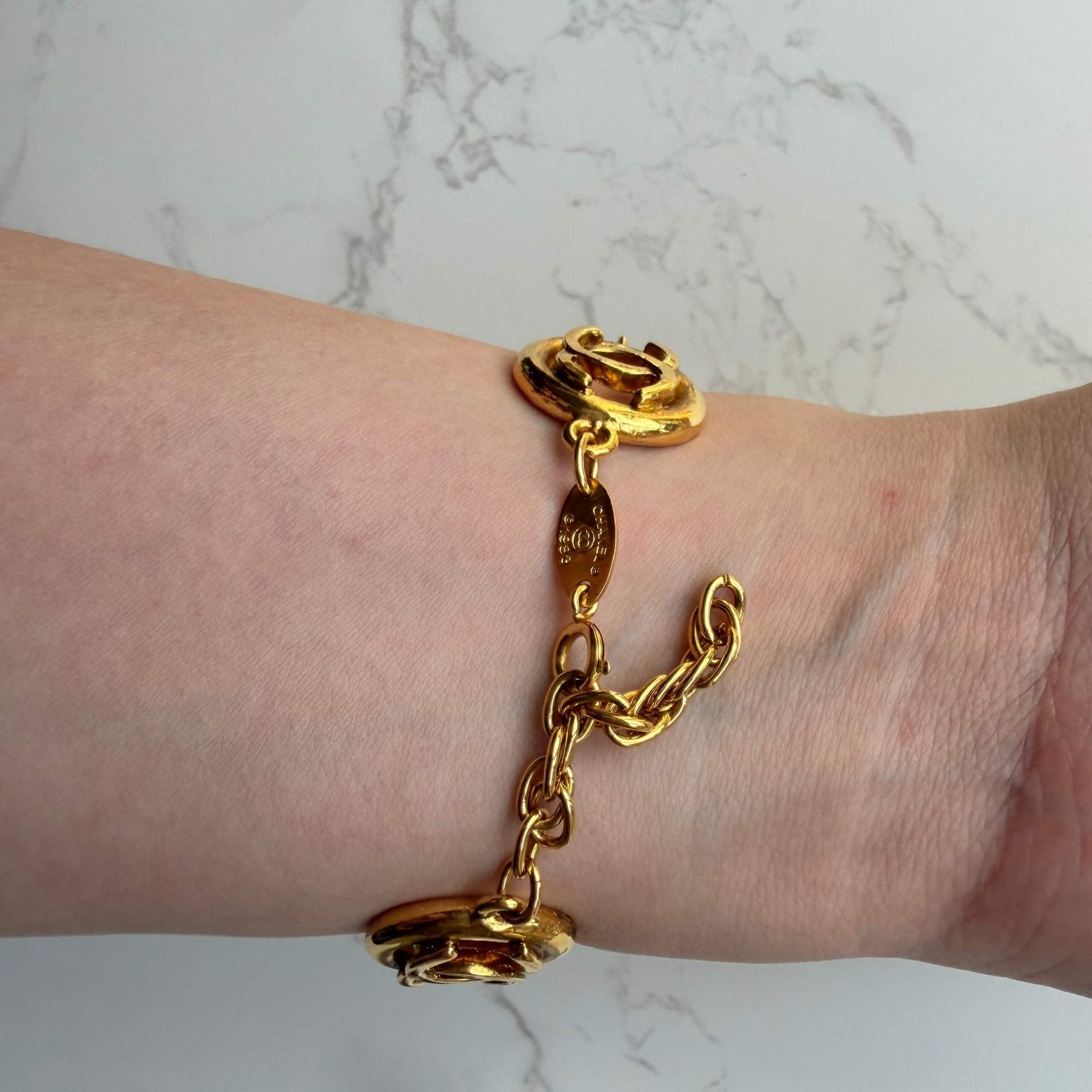 Chanel CC logo bracelet close up