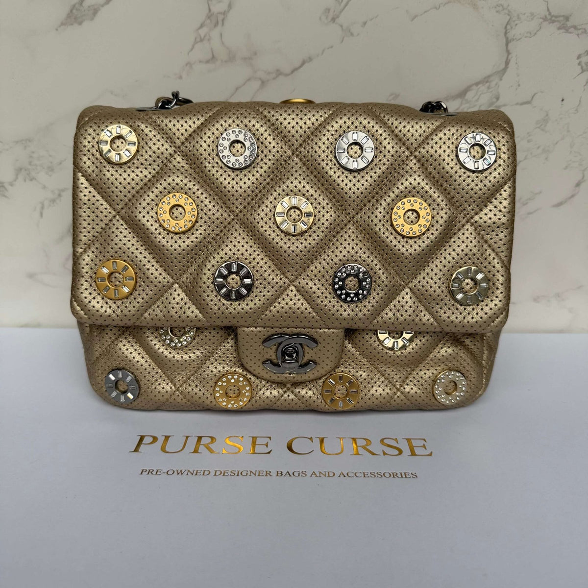 Chanel Paris Dubai metallic medals flap