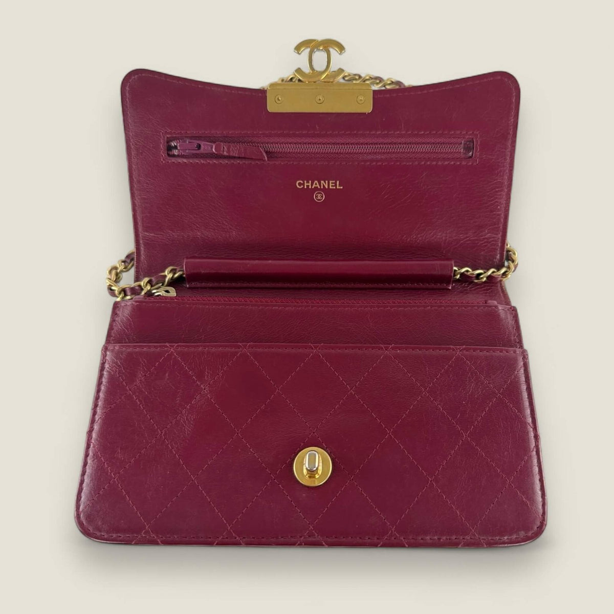 Chanel WOC interior with gold necklace