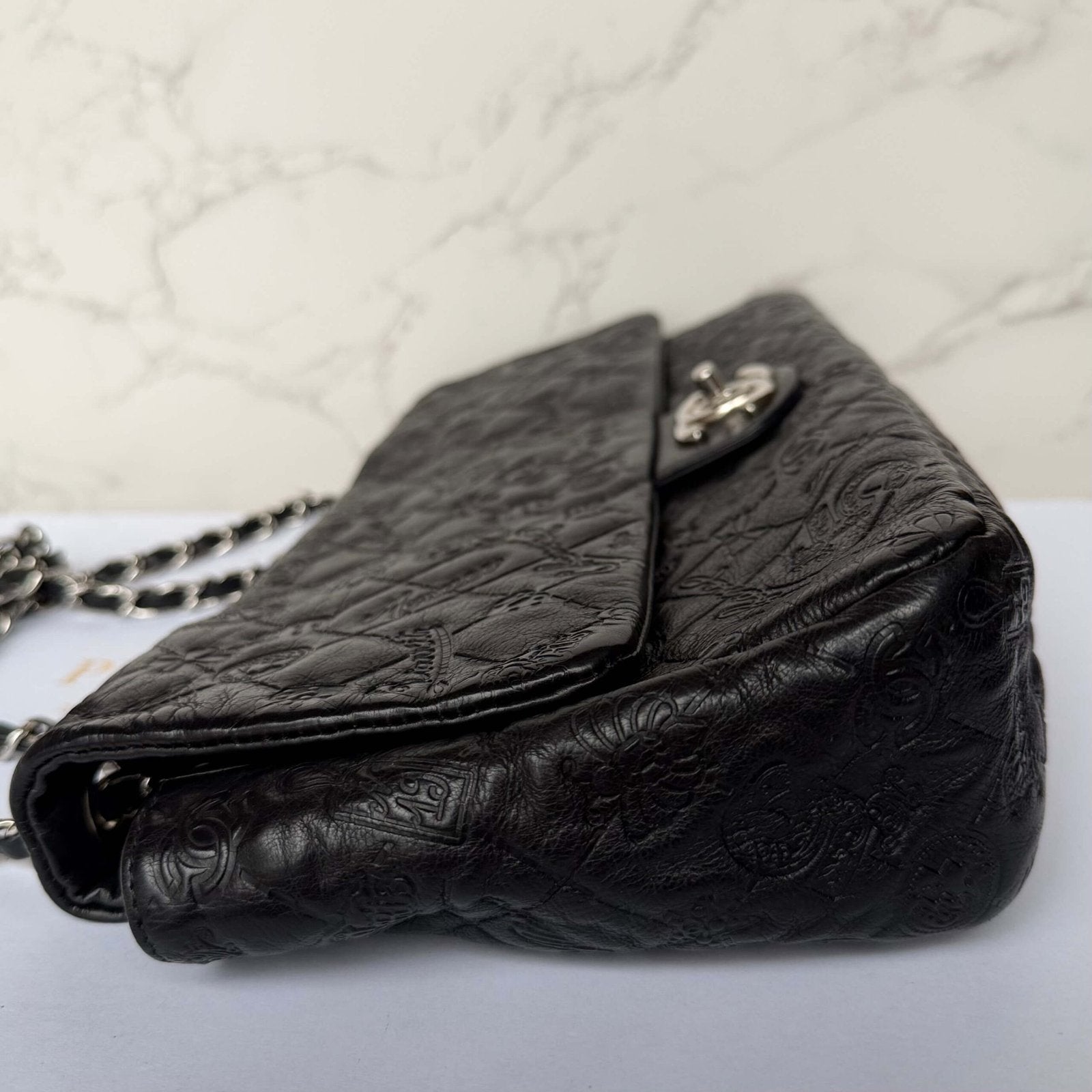 Chanel jumbo embossed calfskin lucky symbols detail leather