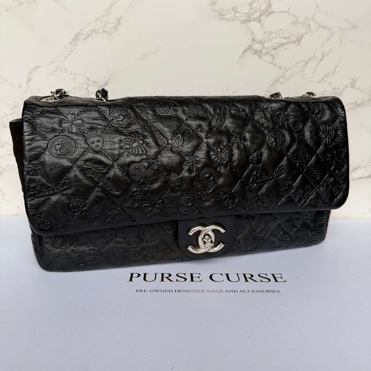 Chanel jumbo lucky symbols leather texture close up