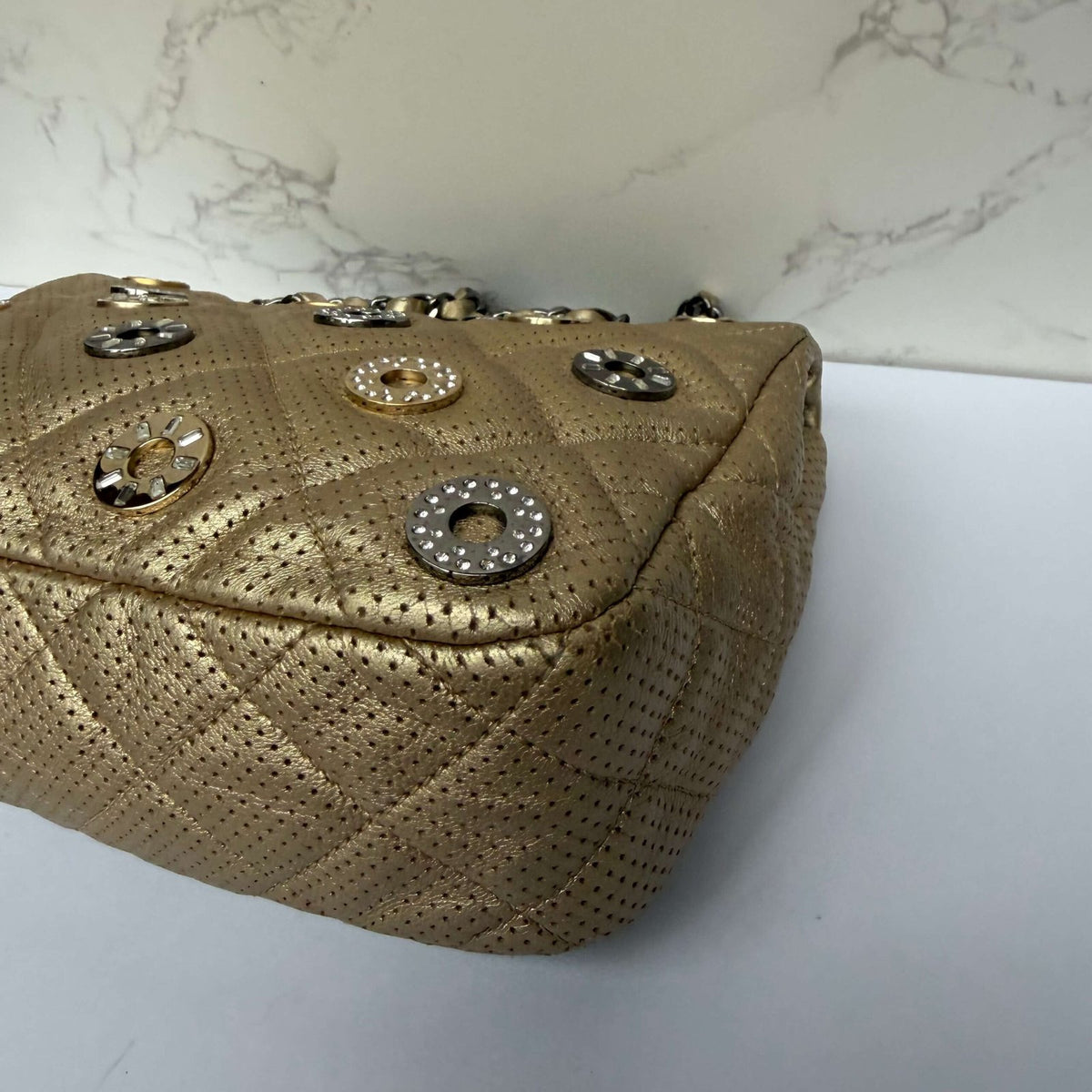 Chanel perforated leather detail close-up