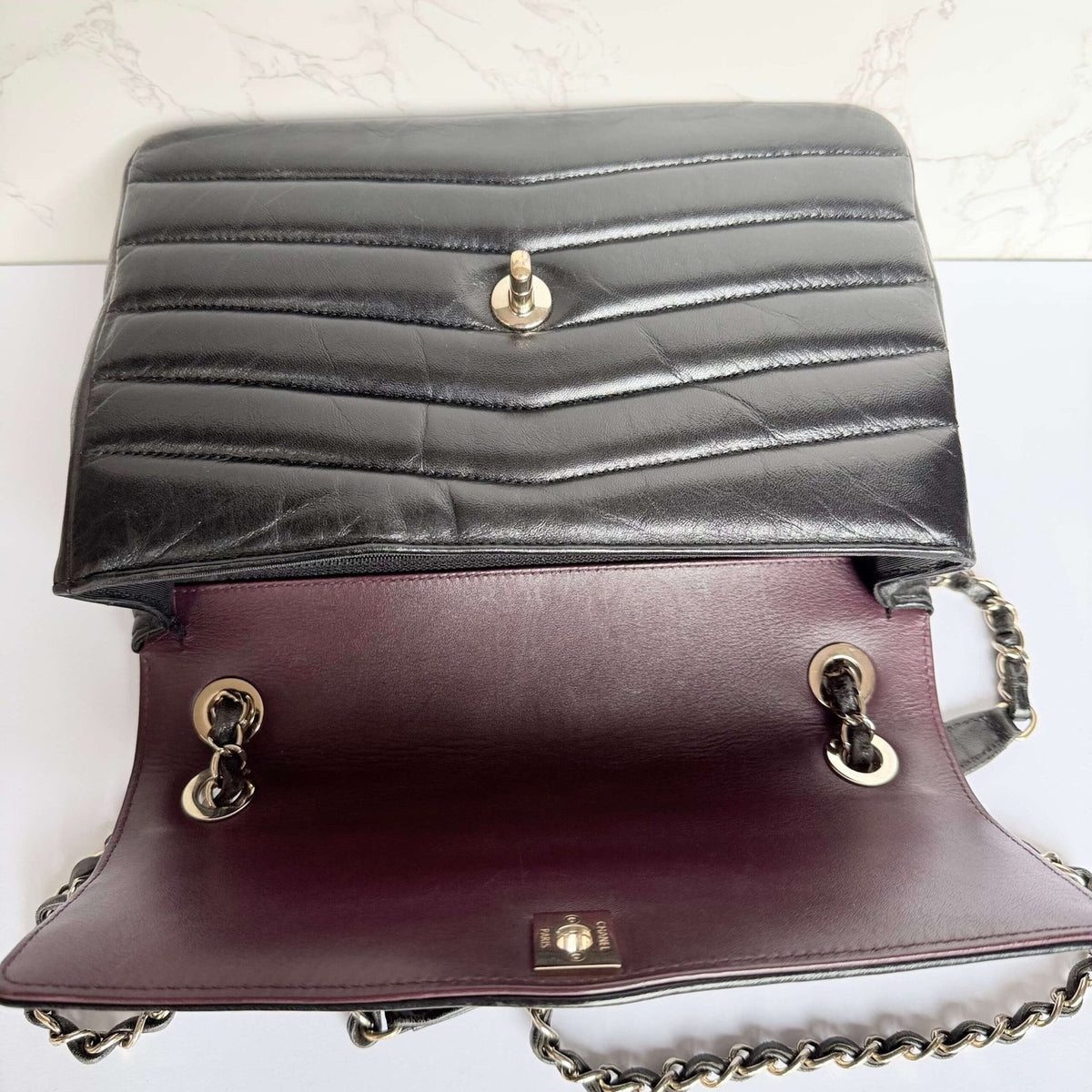 Chanel reversed chevron flap