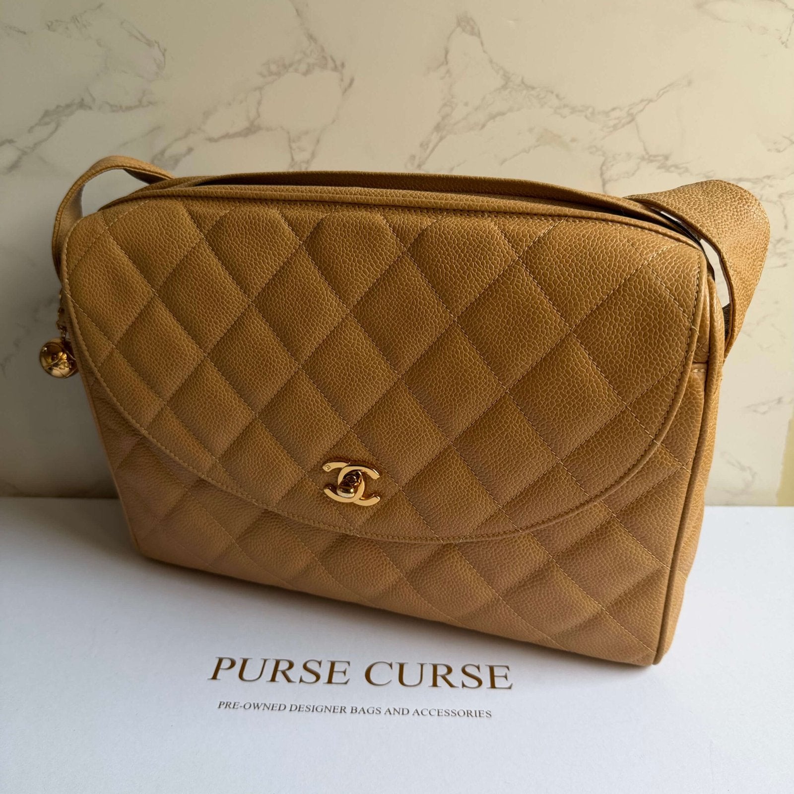 Chanel vintage caviar camera bag beige