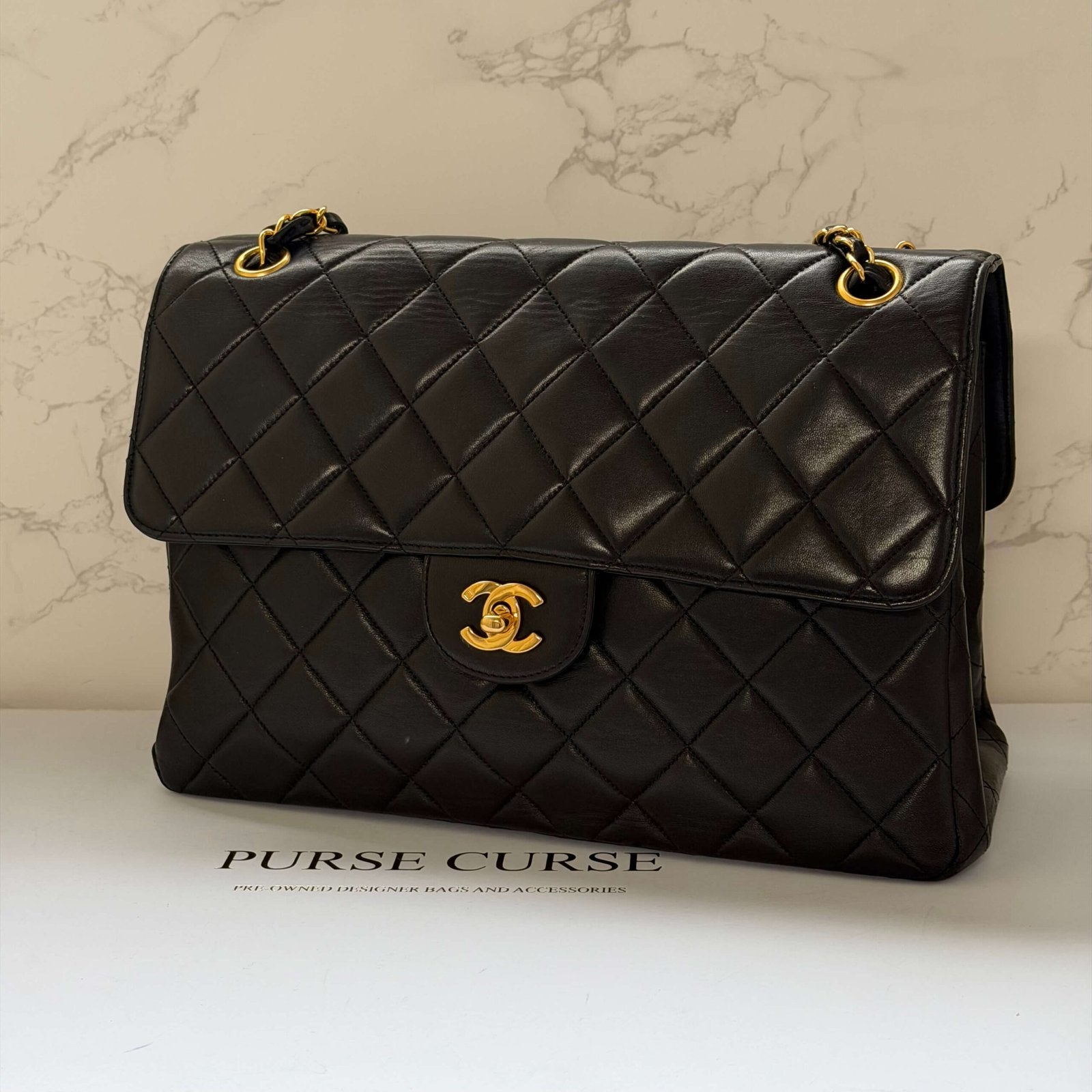 Chanel vintage jumbo flap bag black lambskin 24k gold