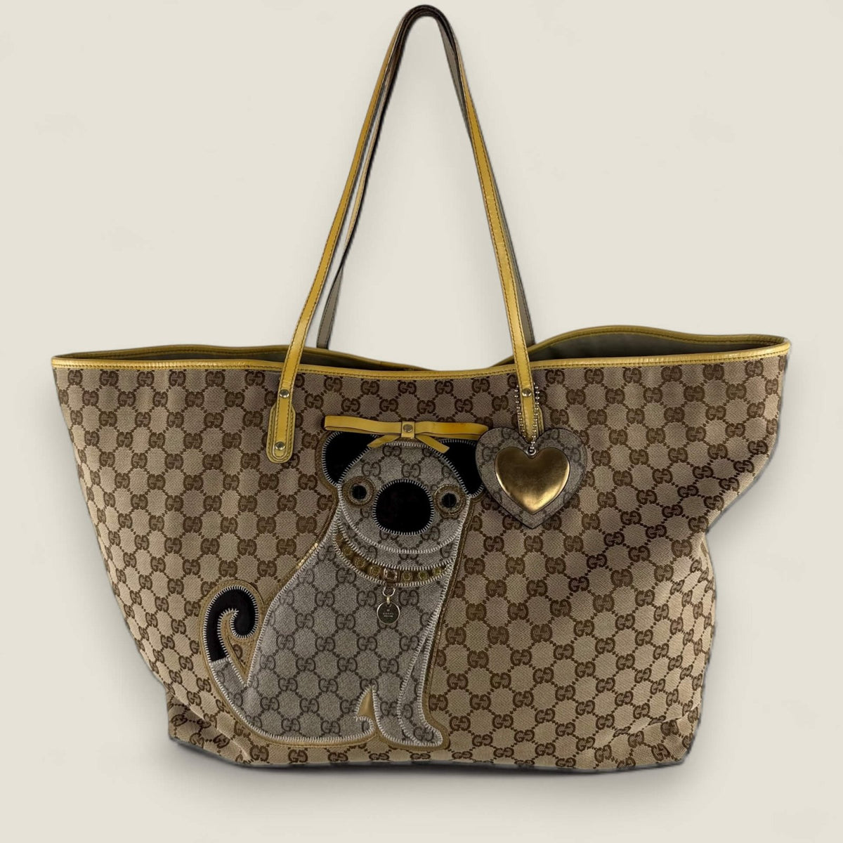 Gucci designer handbag with pug