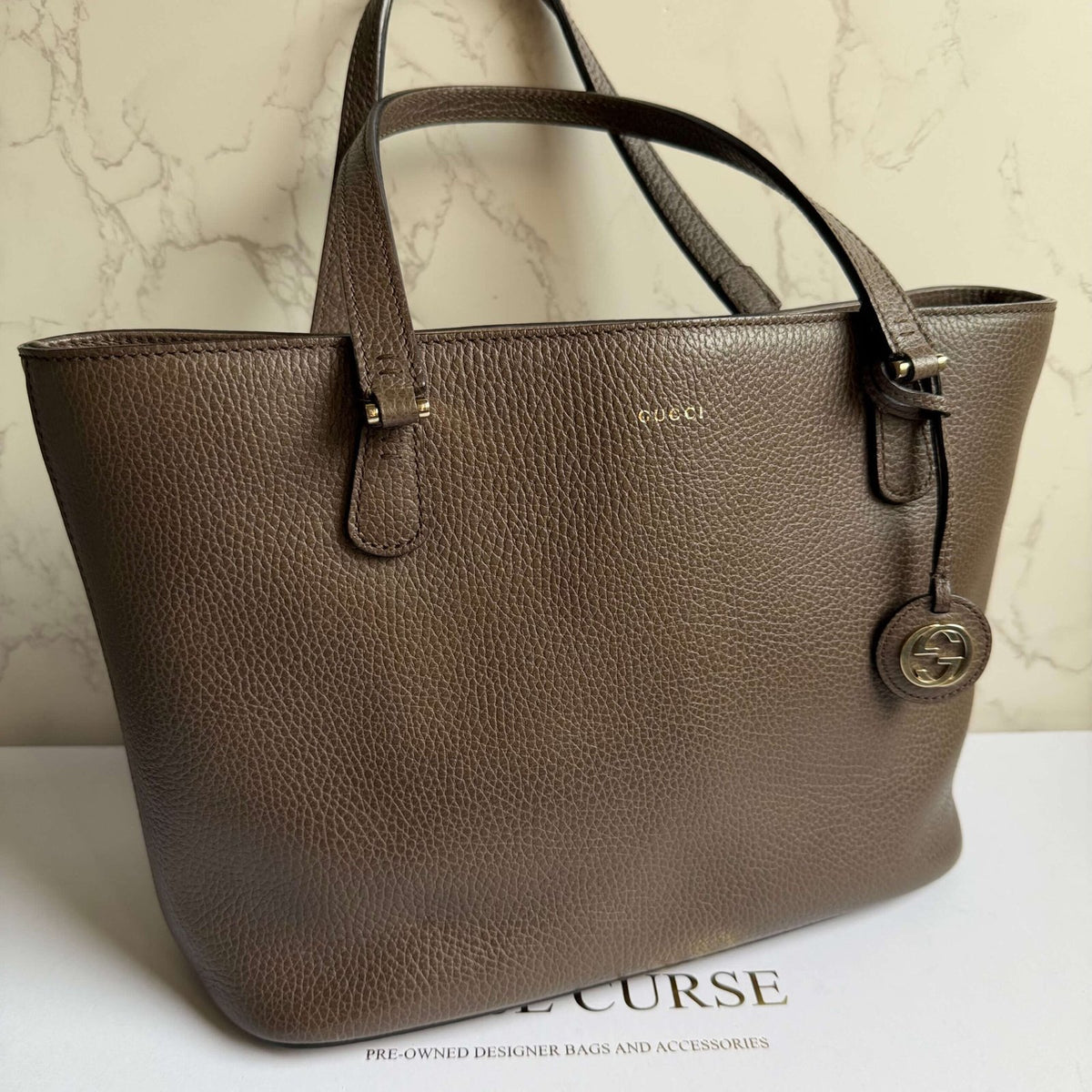 Gucci pebbled leather tote brown