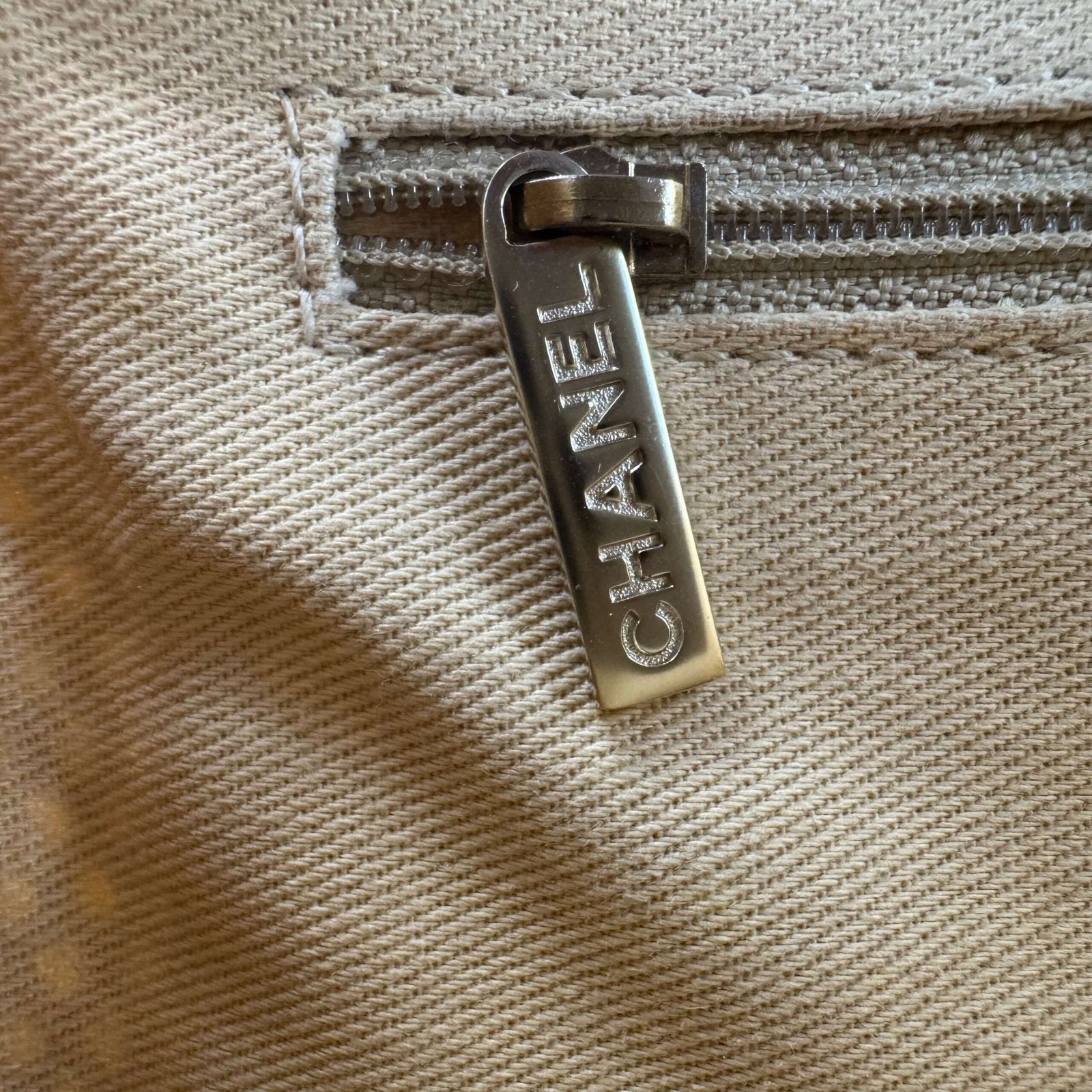 Hardware zip Chanel bag
