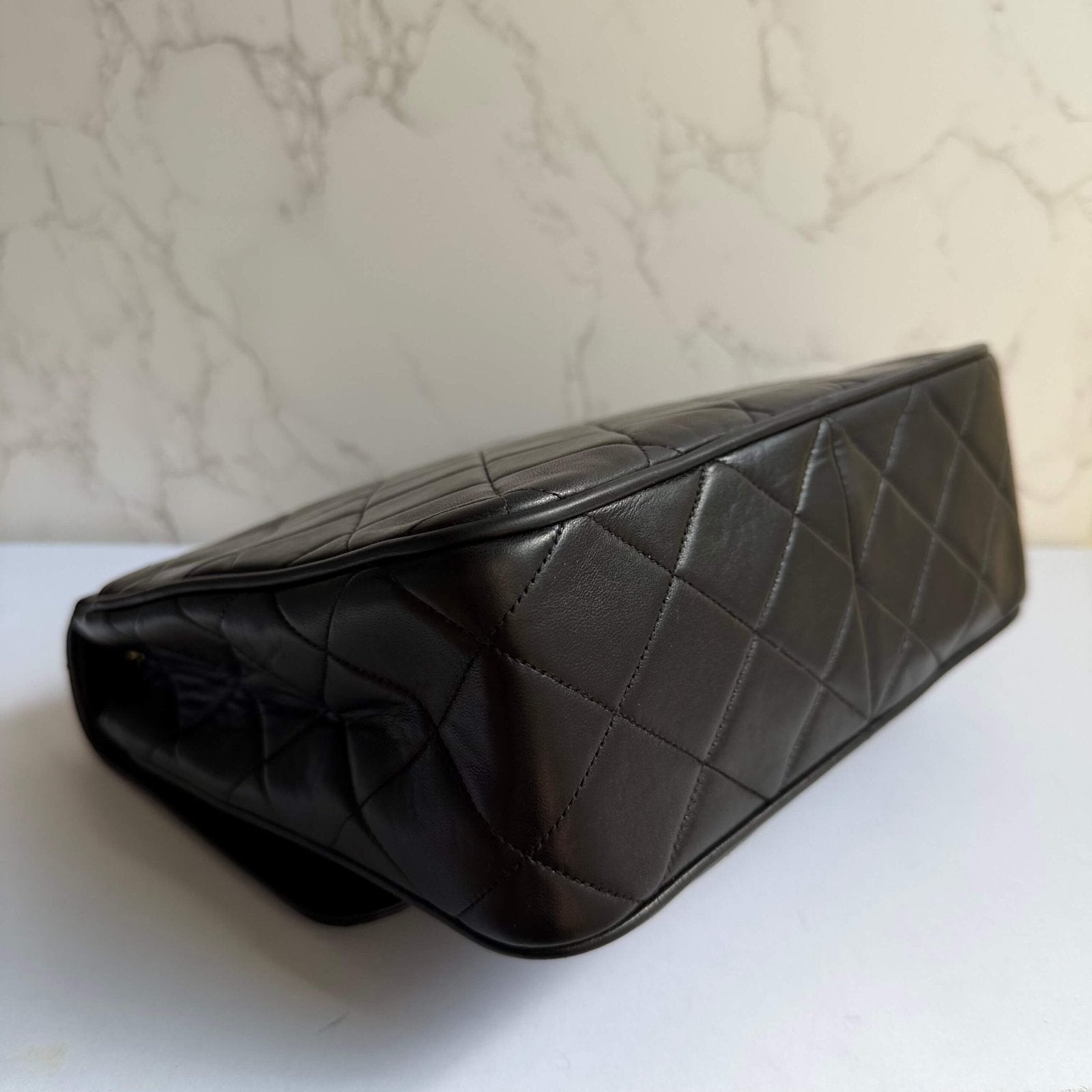 Corners of authentic pre-owned Chanel bag