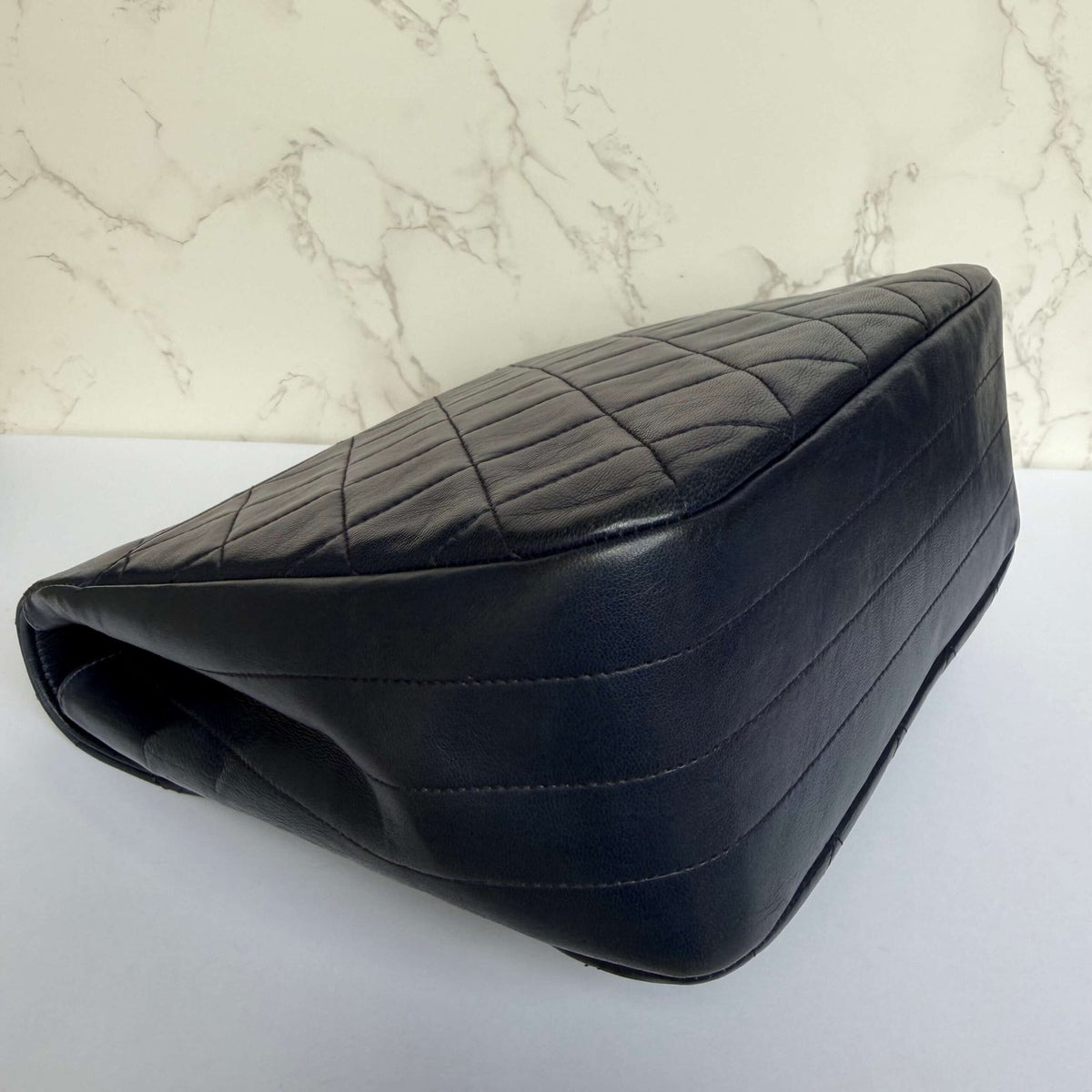 Corners of authentic Chanel vintage single flap bag