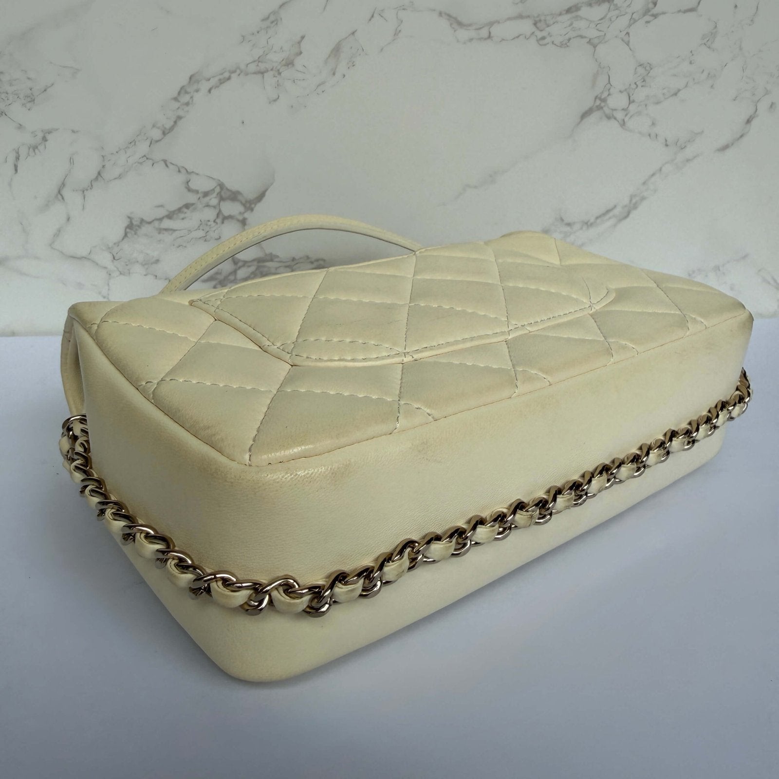 Corners of the original Chanel flap bag crossbody