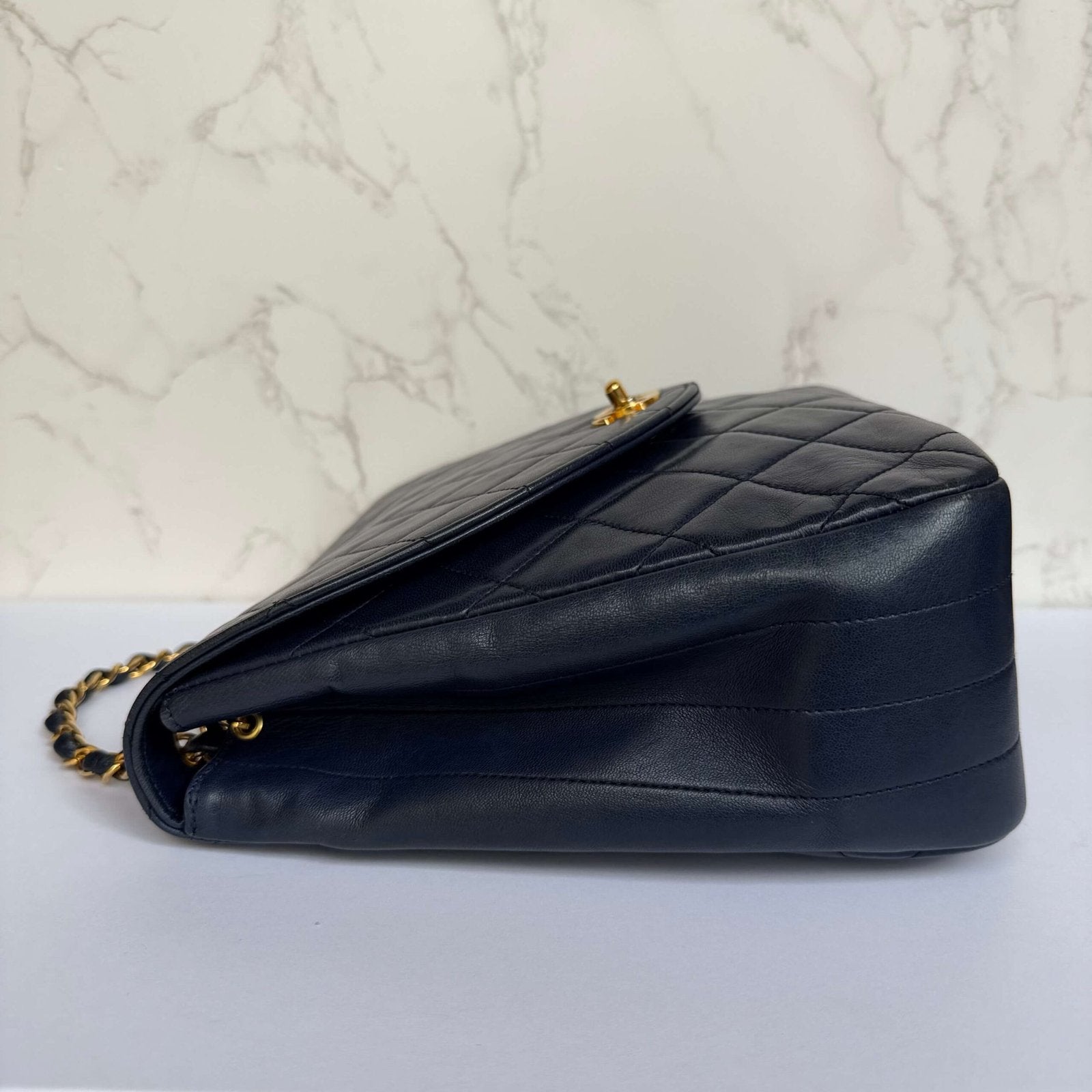 Side view of original vintage Chanel lambskin shoulder bag