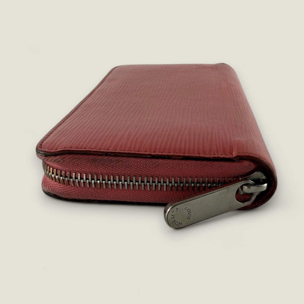 Louis Vuitton Epi leather texture pink close-up