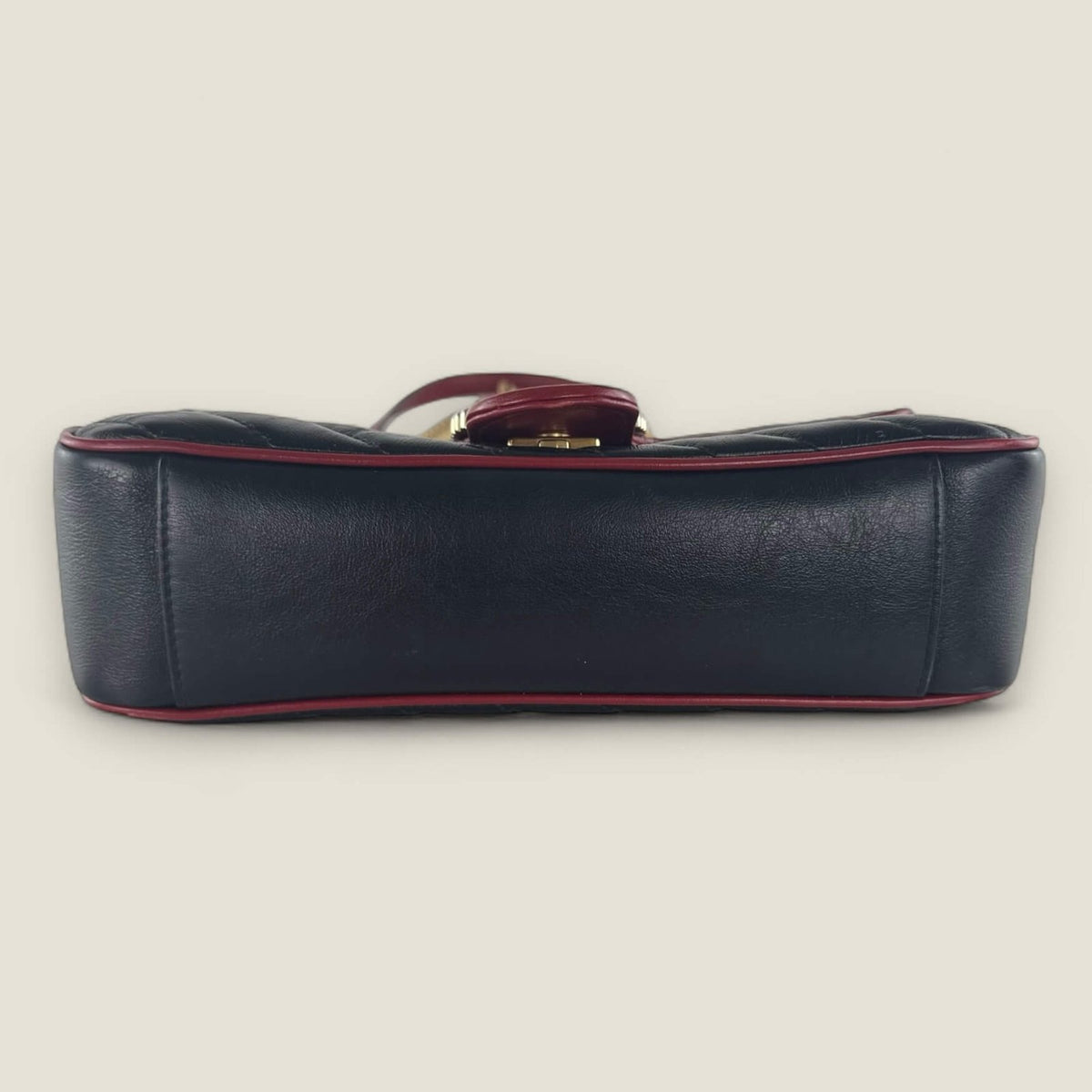Onderkant originele Gucci tas