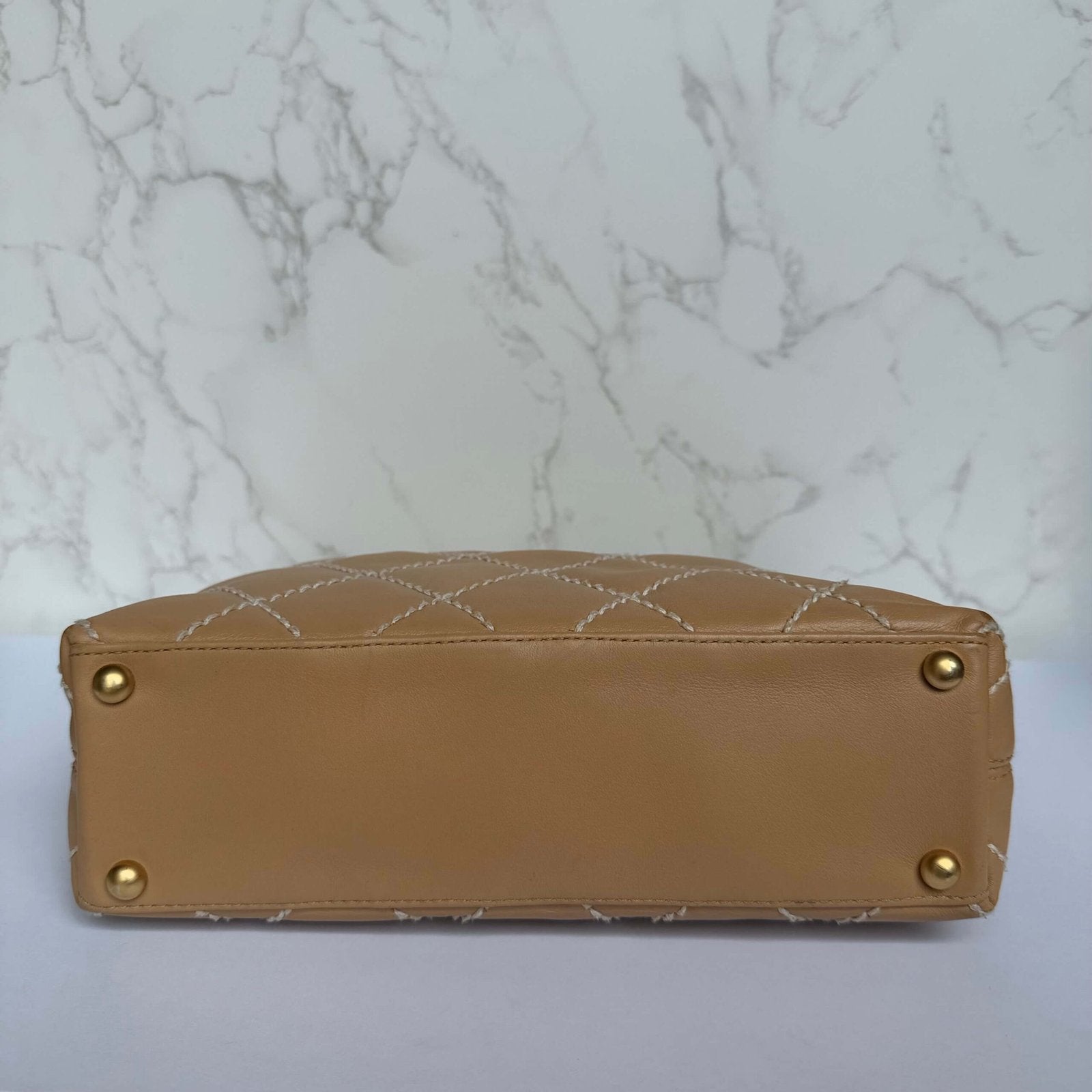 Bottom vintage Chanel bag beige
