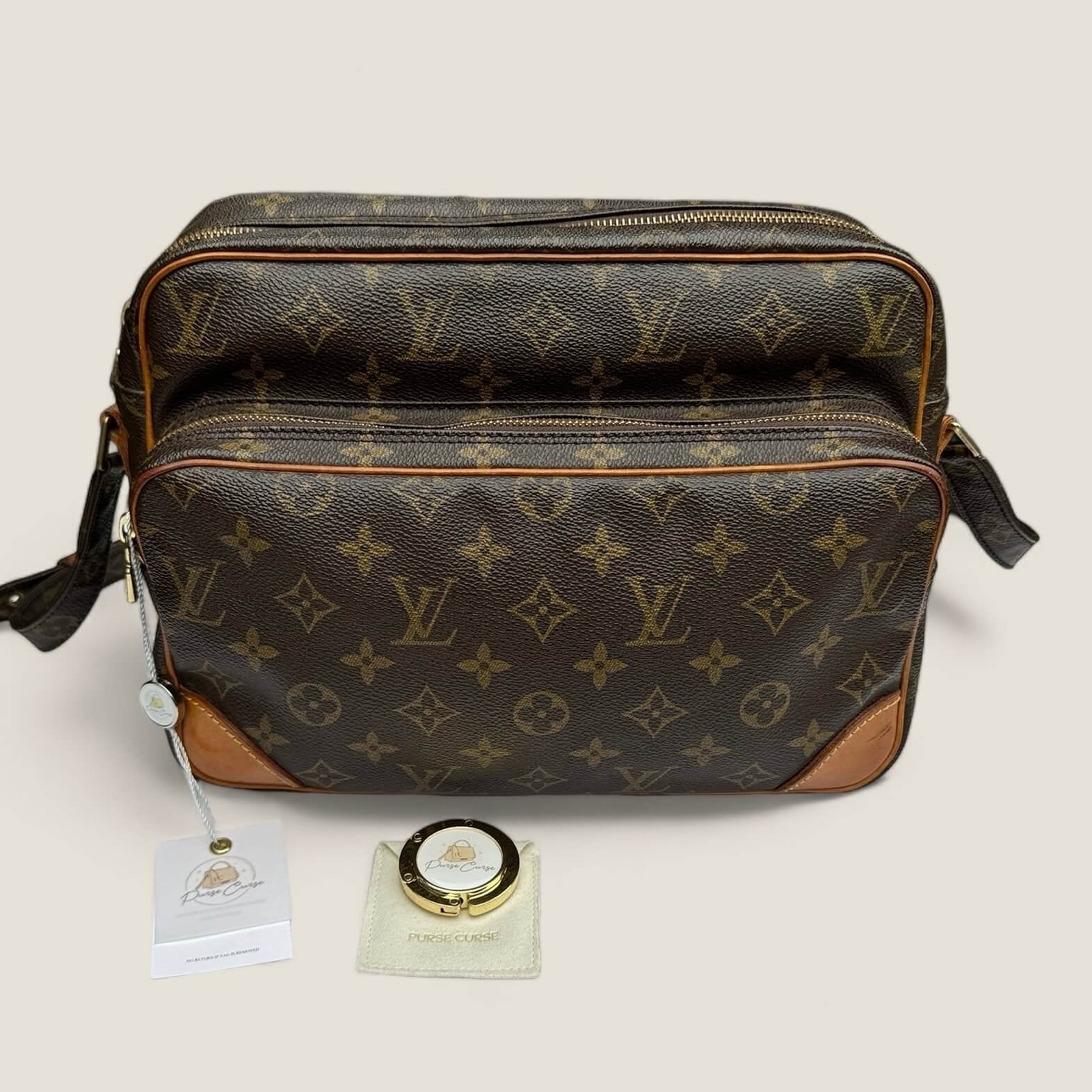 Pre-owned Louis Vuitton Nile bag with Purse Curse bag holder