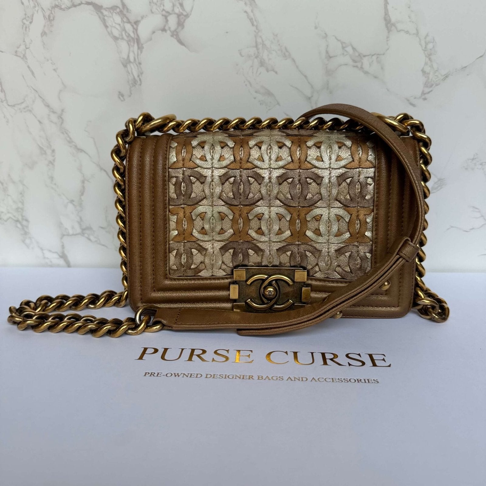 Second hand Chanel Boy bag small CC logo