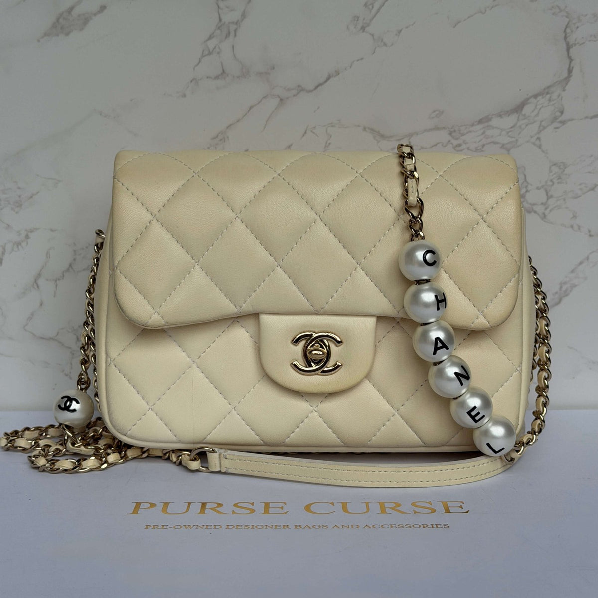 Second hand Chanel my precious pearl chain flap