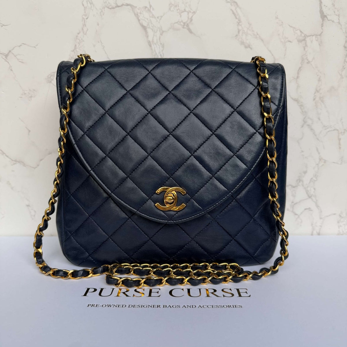 Second-hand vintage dark navy crossbody flap bag